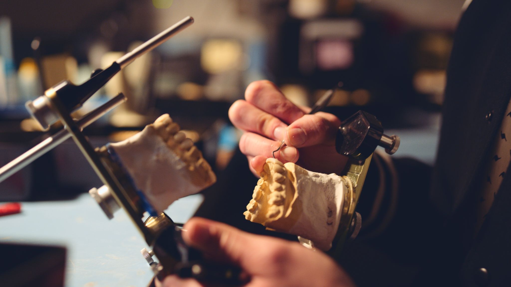 Closeup side view of a dental mold being worked on