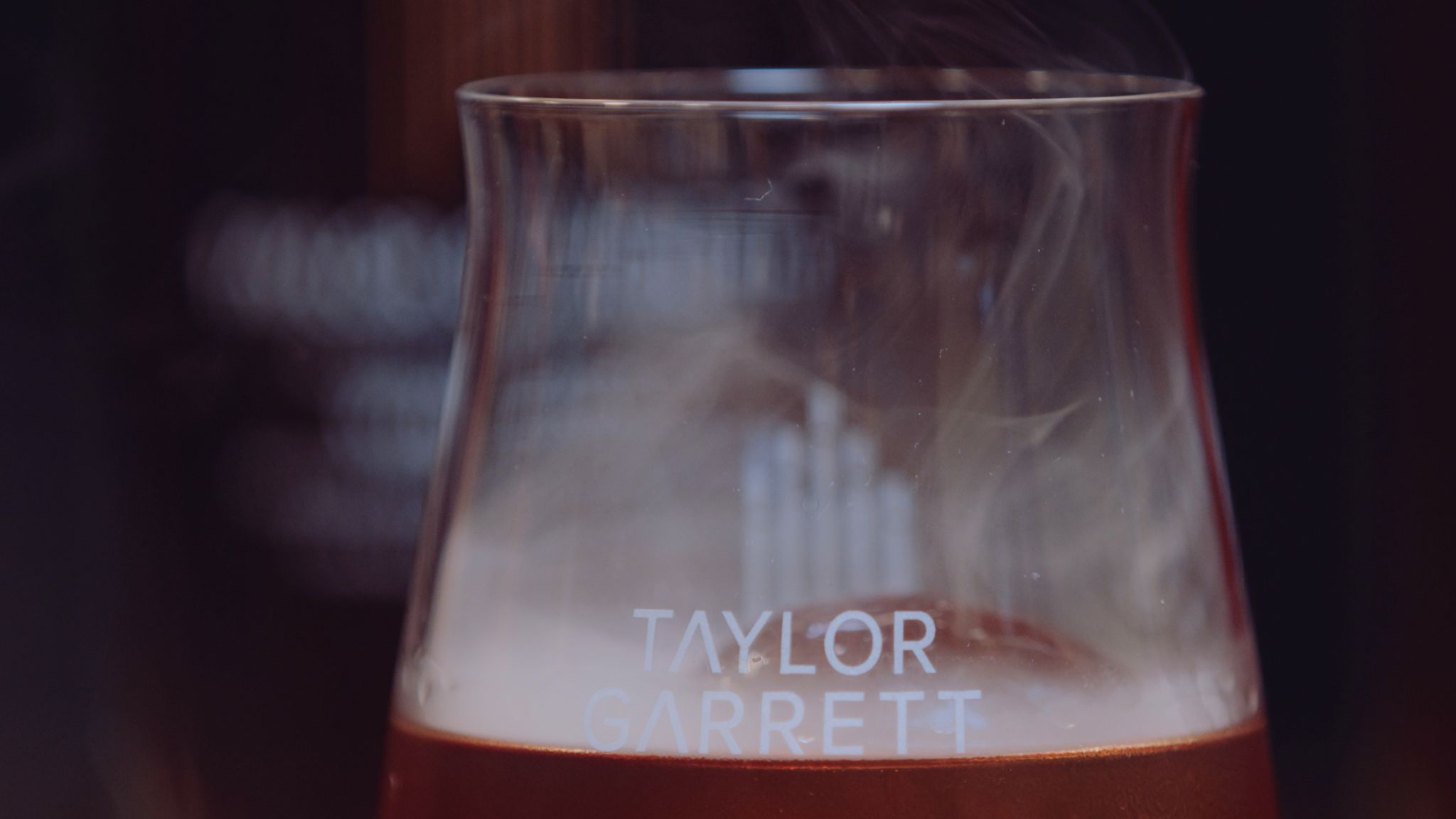 IU C&I Studios Portfolio Taylor Garrett Spirits Closeup of glass with some whiskey in it