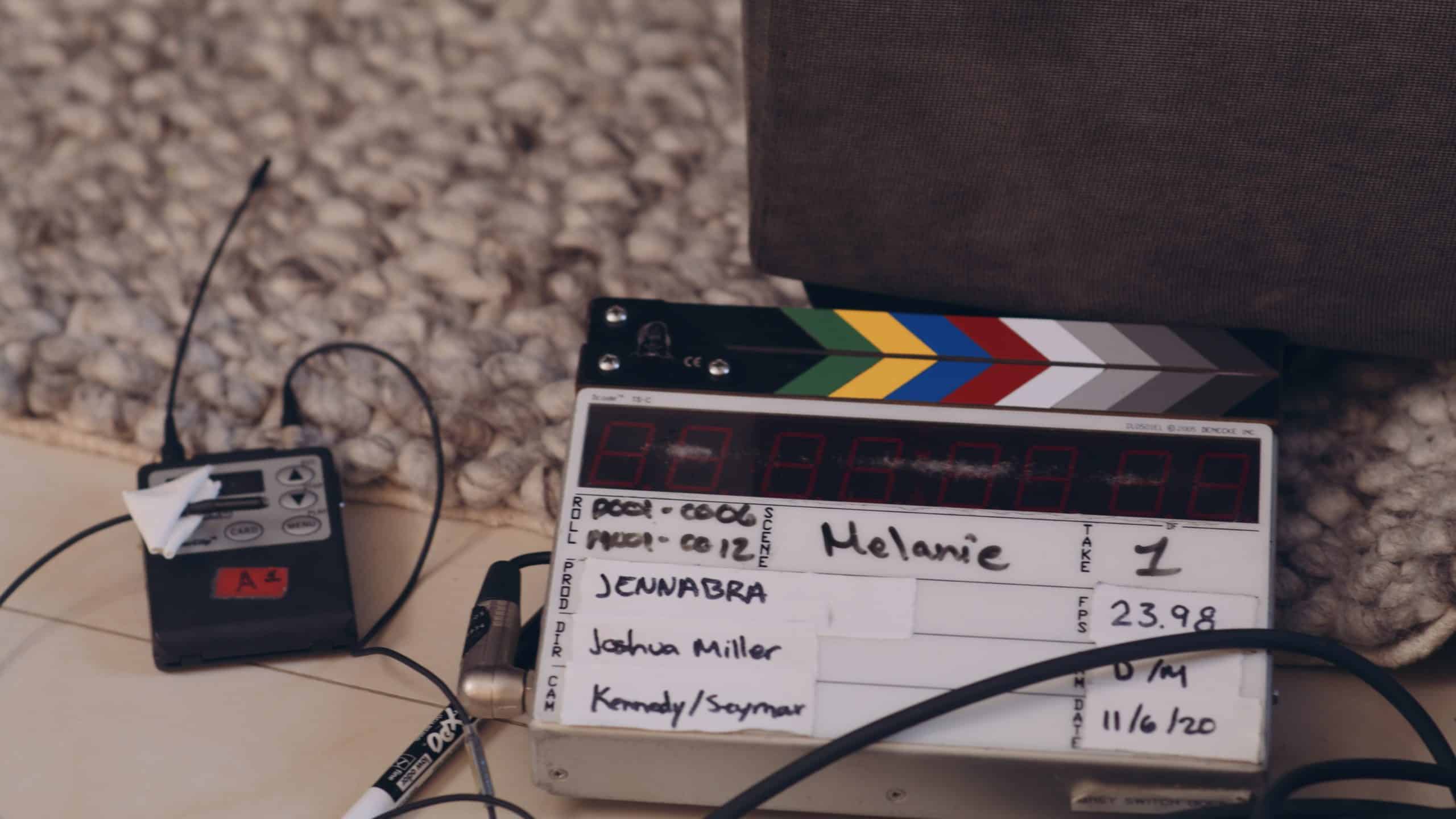 Closeup of clap board and remote