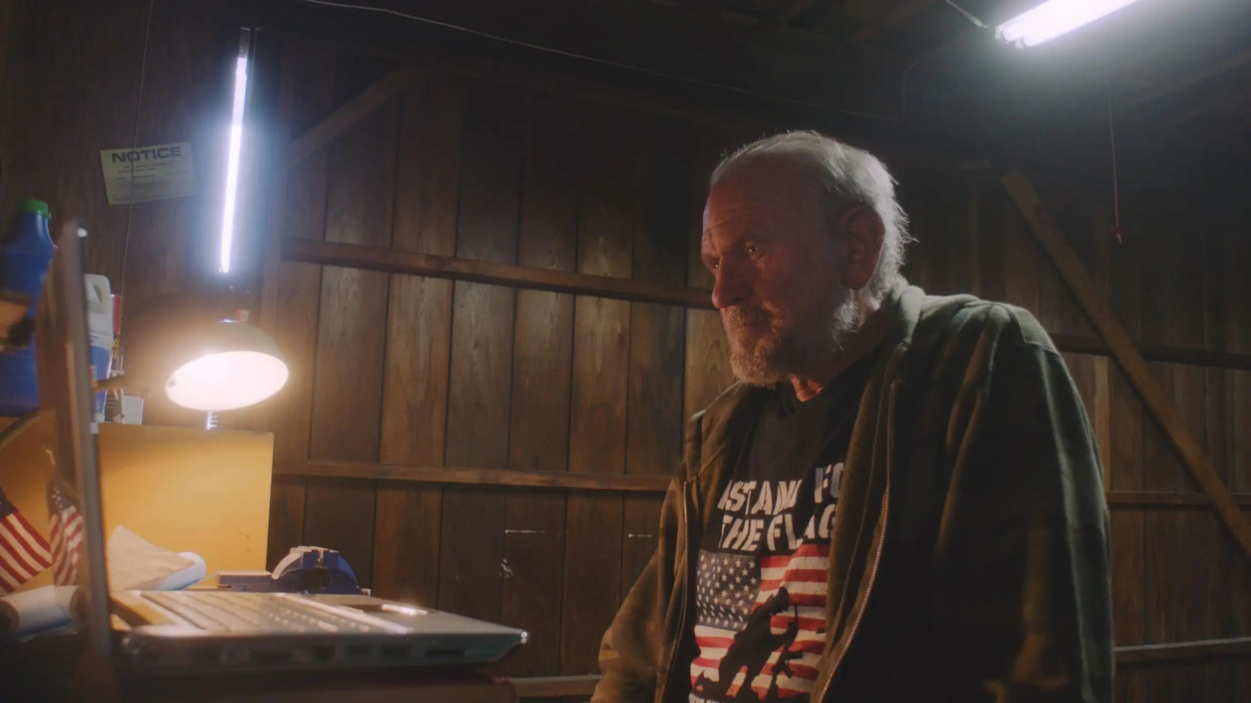 Bart McCarthy - Q Guy 11 Side profile headshot of Bart McCarthy looking at laptop