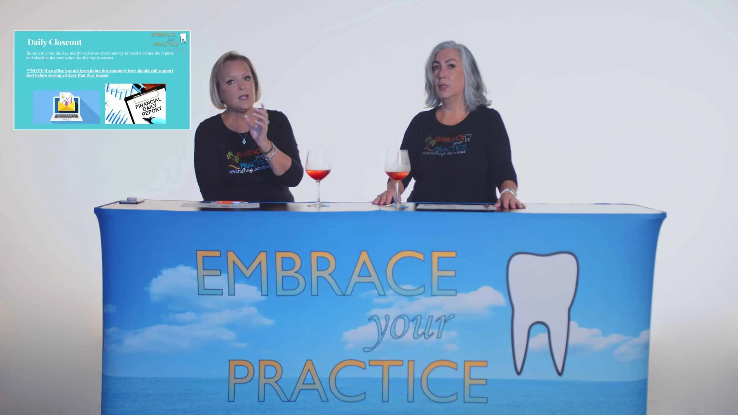 Embrace Your Practice 9 Two women sitting at a table with banner and near glasses with red wine talking to the camera with Daily Closeout insert