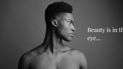 IU C&I Studios Portfolio And Page Beauty Featured Image Black And White Headshot Of Bare Chested Male Model Looking Off To The Side With White Beauty Is In The Eye Text