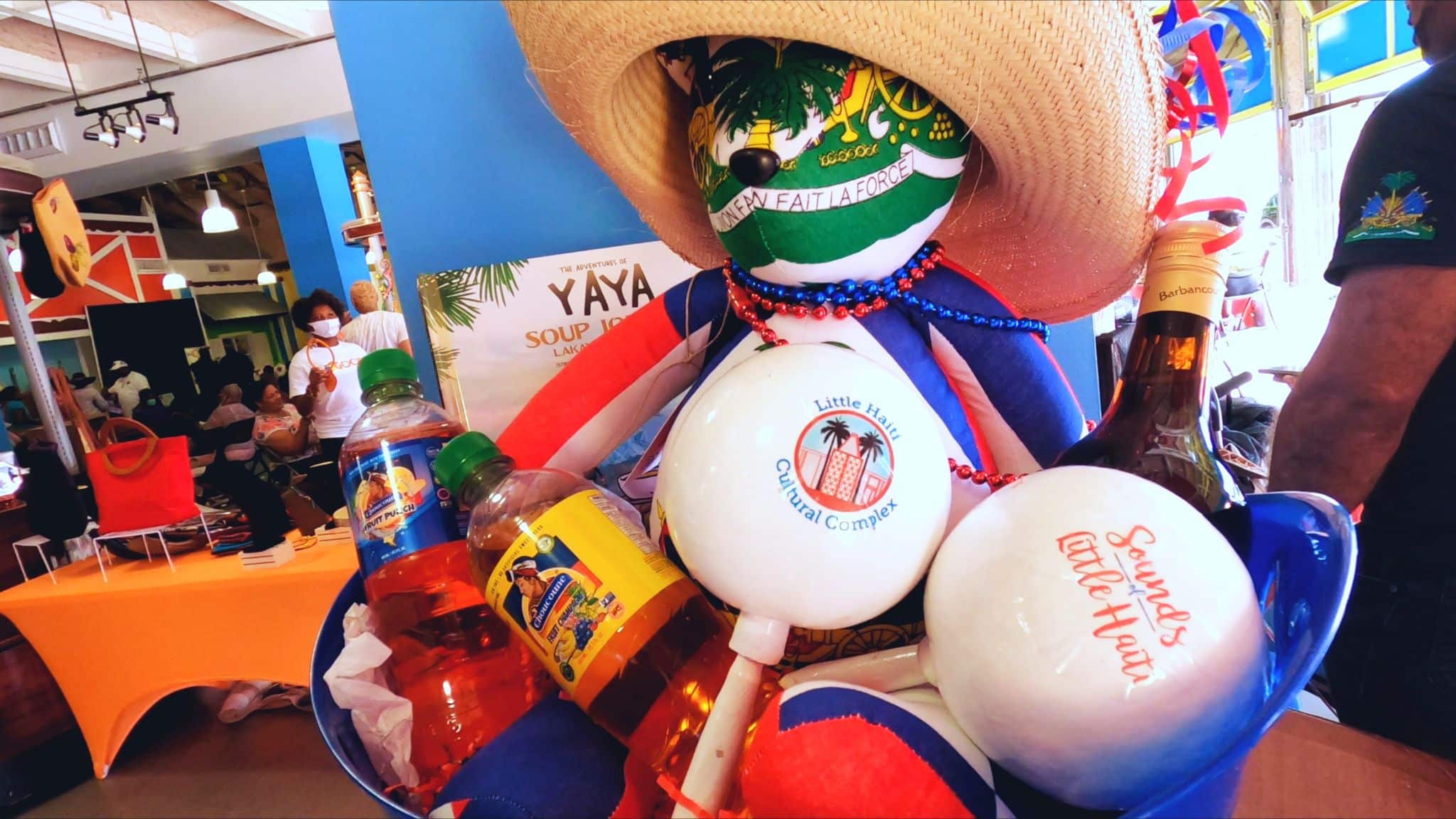 DRAFT IU C&I Studio Portfolio Island TV November Little Hairit Cultural Center Art Basel Maracas and drinks on display
