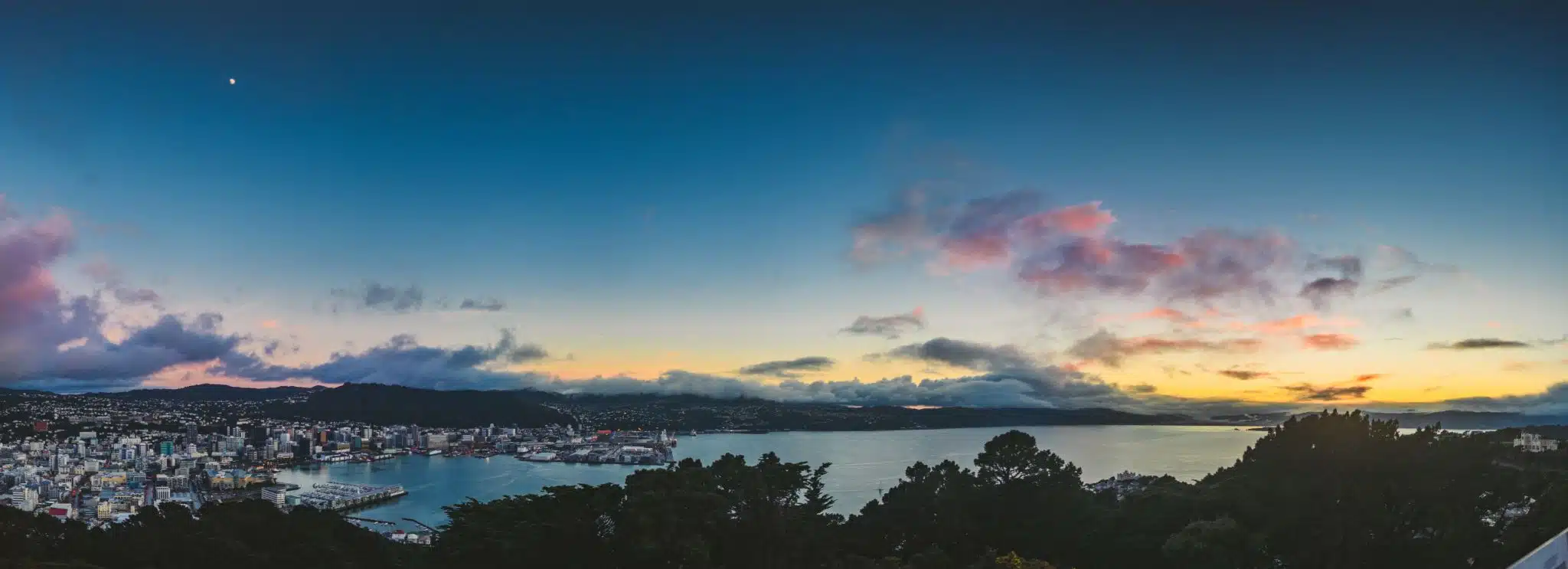 Aerial view of harbor with boats at sunrise