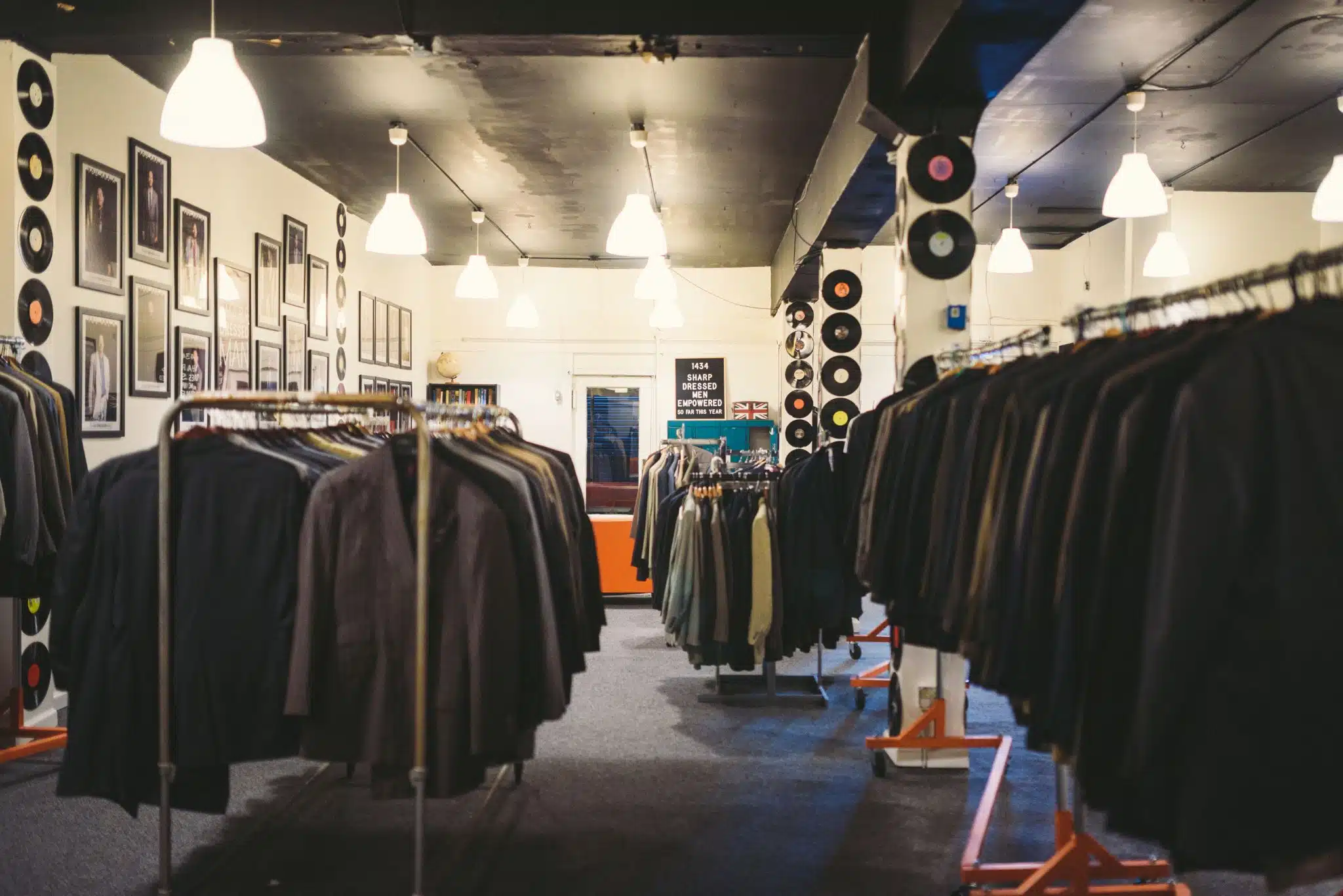 Racks of jackets and shirts on display