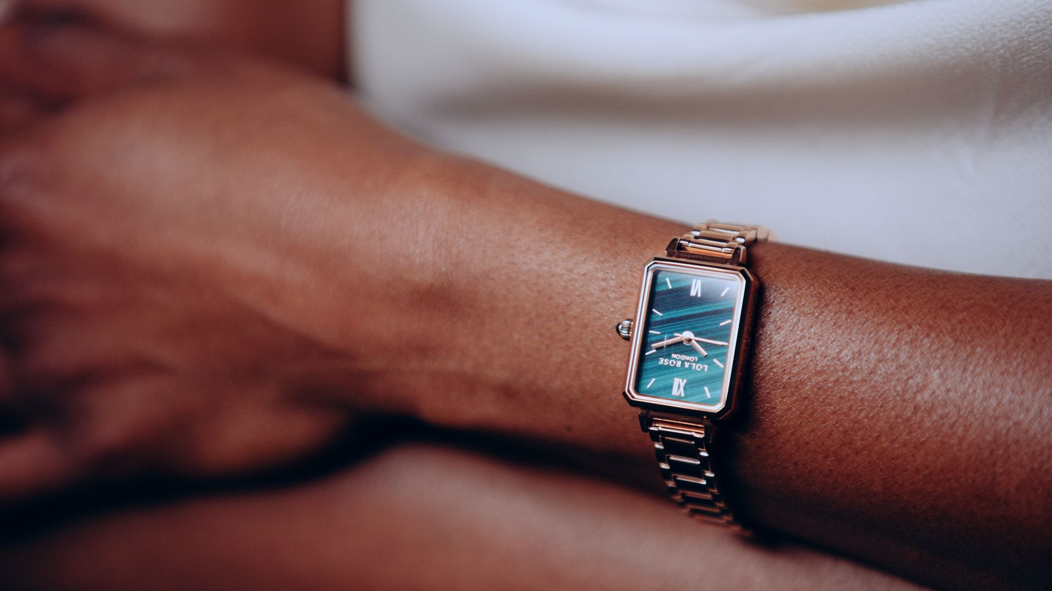 Closeup of watch on an African American female arm