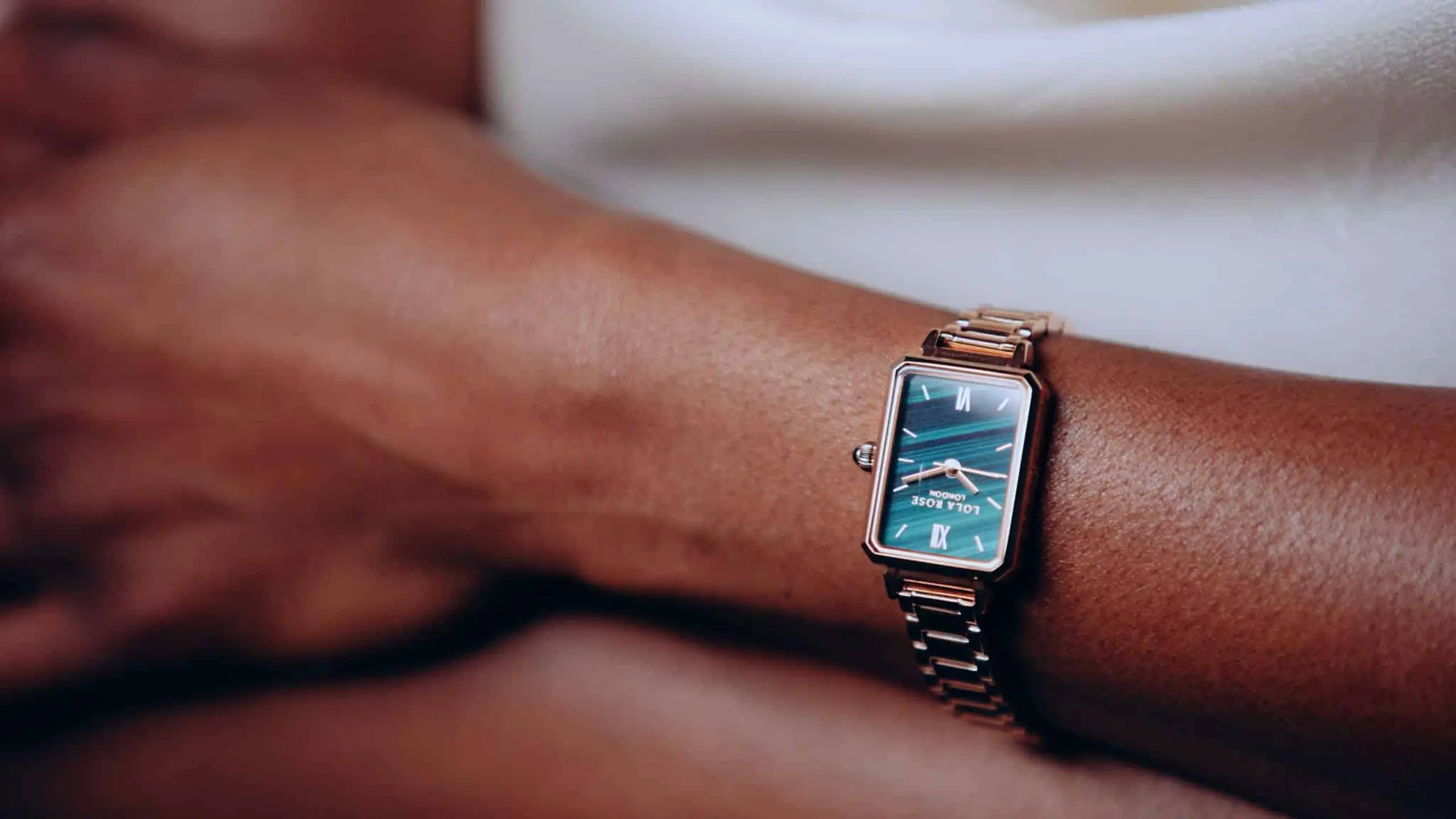 Closeup of watch on an African American female arm