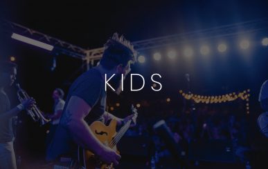 IU C&I Studios Portfolio And Page Kids Indie Rock Band White Kids Logo With Background Of A Band Playing In A Concert For An Audience