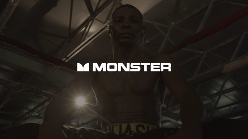 IU C&I Studios Portfolio and Page White Monster Music Cable Logo with dimmed background of African American boxer standing in the corner of a ring