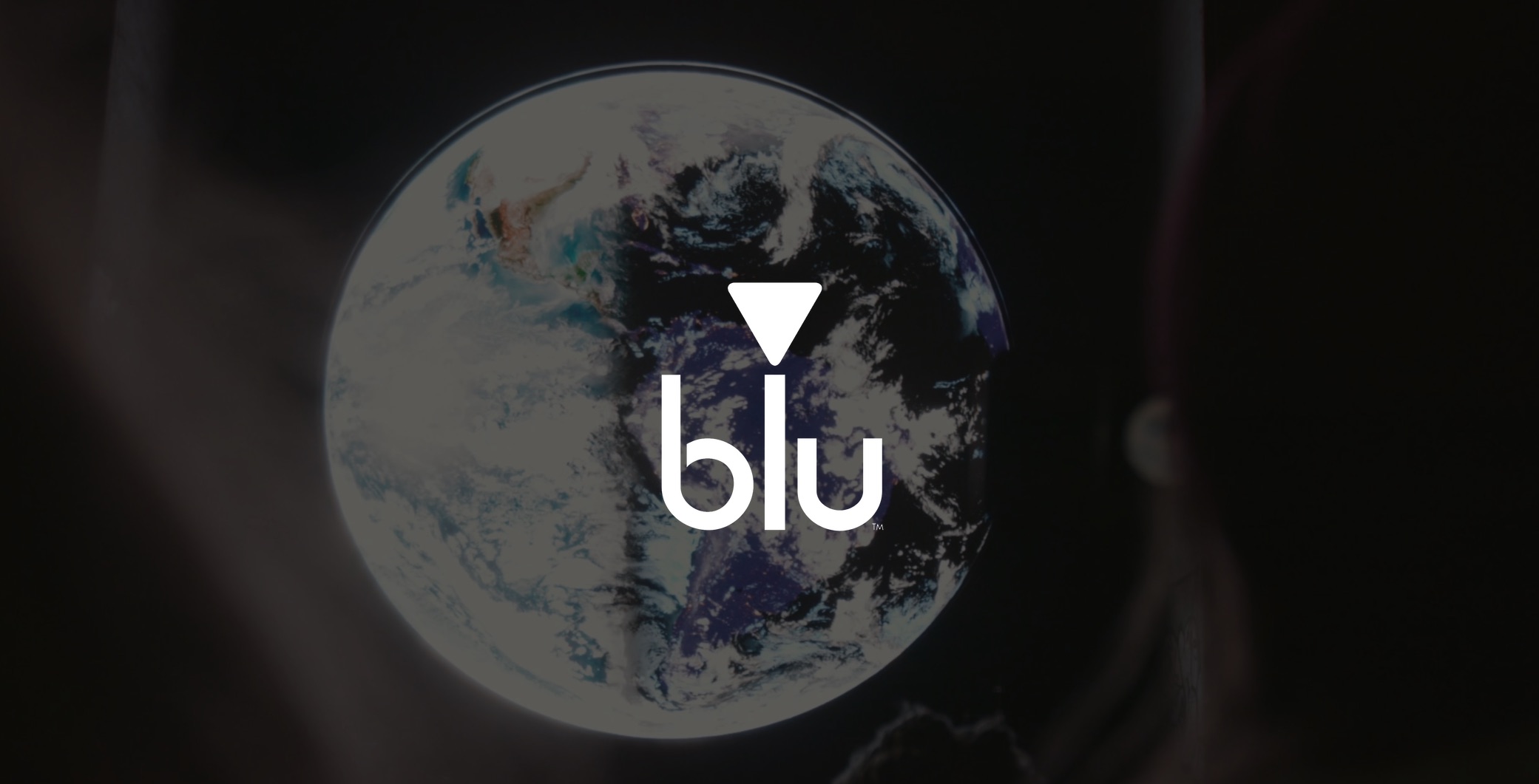 White Blu logo on background of earth art