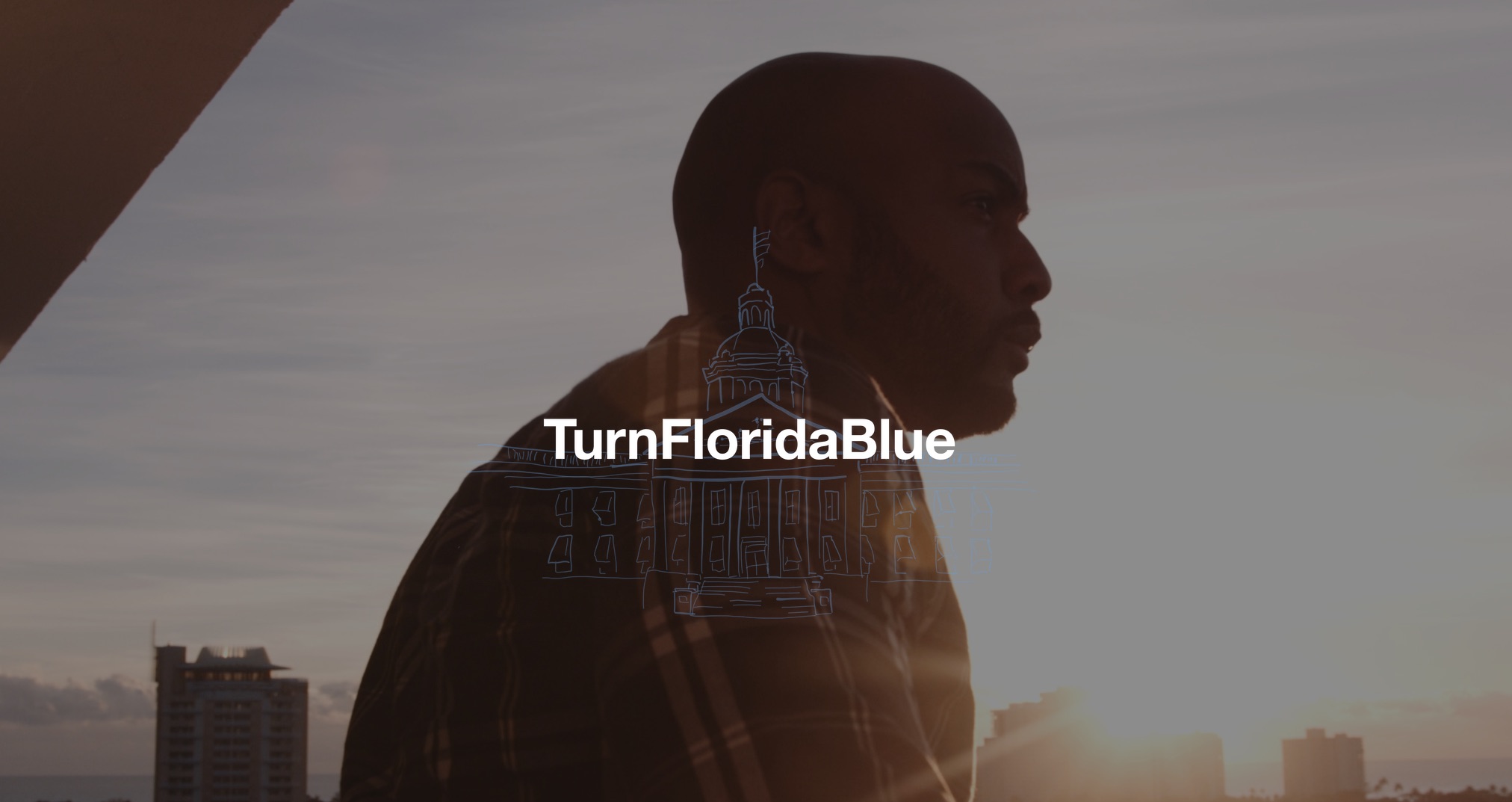 Florida House Victory Campaign White and blue Turn Florida Blue logo on backdrop of side profile of man wearing flannel shirt with the setting sun behind him