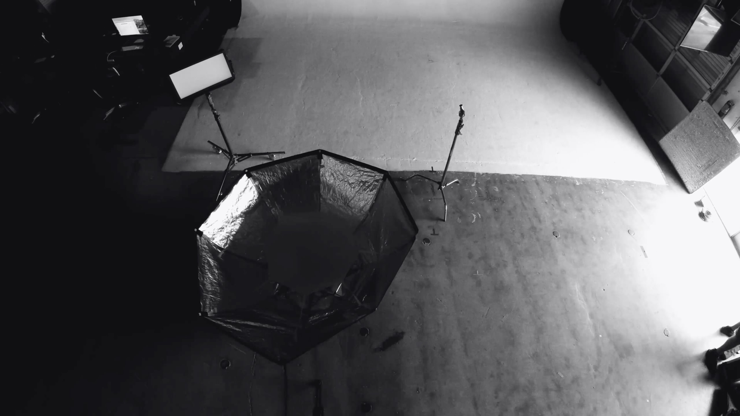 Keyword: Traditional Photography. How to shoot a professional video on a budget Black and white of photography equipment on a set