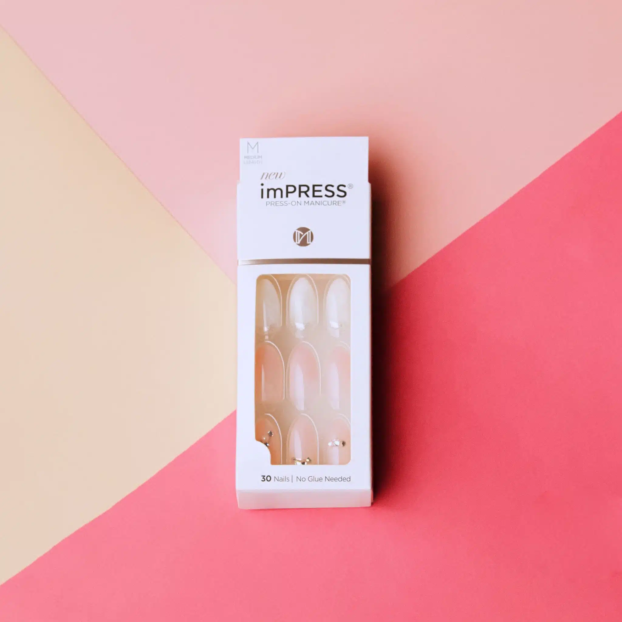 KISS 15 KISS imPRESS Package of nails of different colors on display