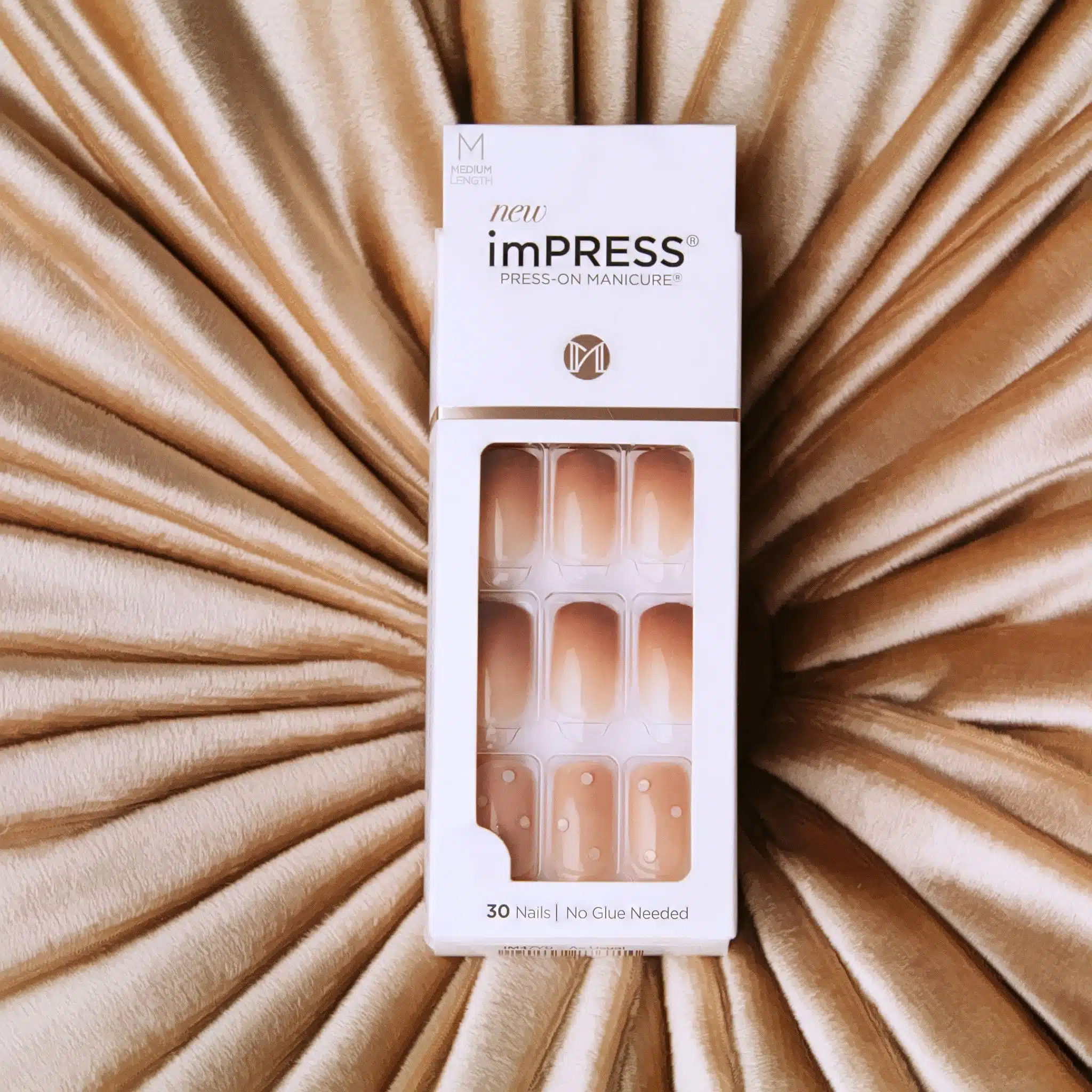 KISS 21 Light brown colored nails on display