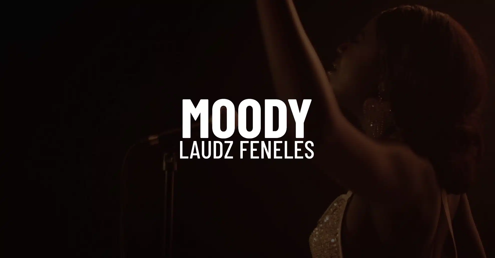 IU C&I Studios Page White Moody Laudz Feneles title on background headshot of her singing with arm in the air