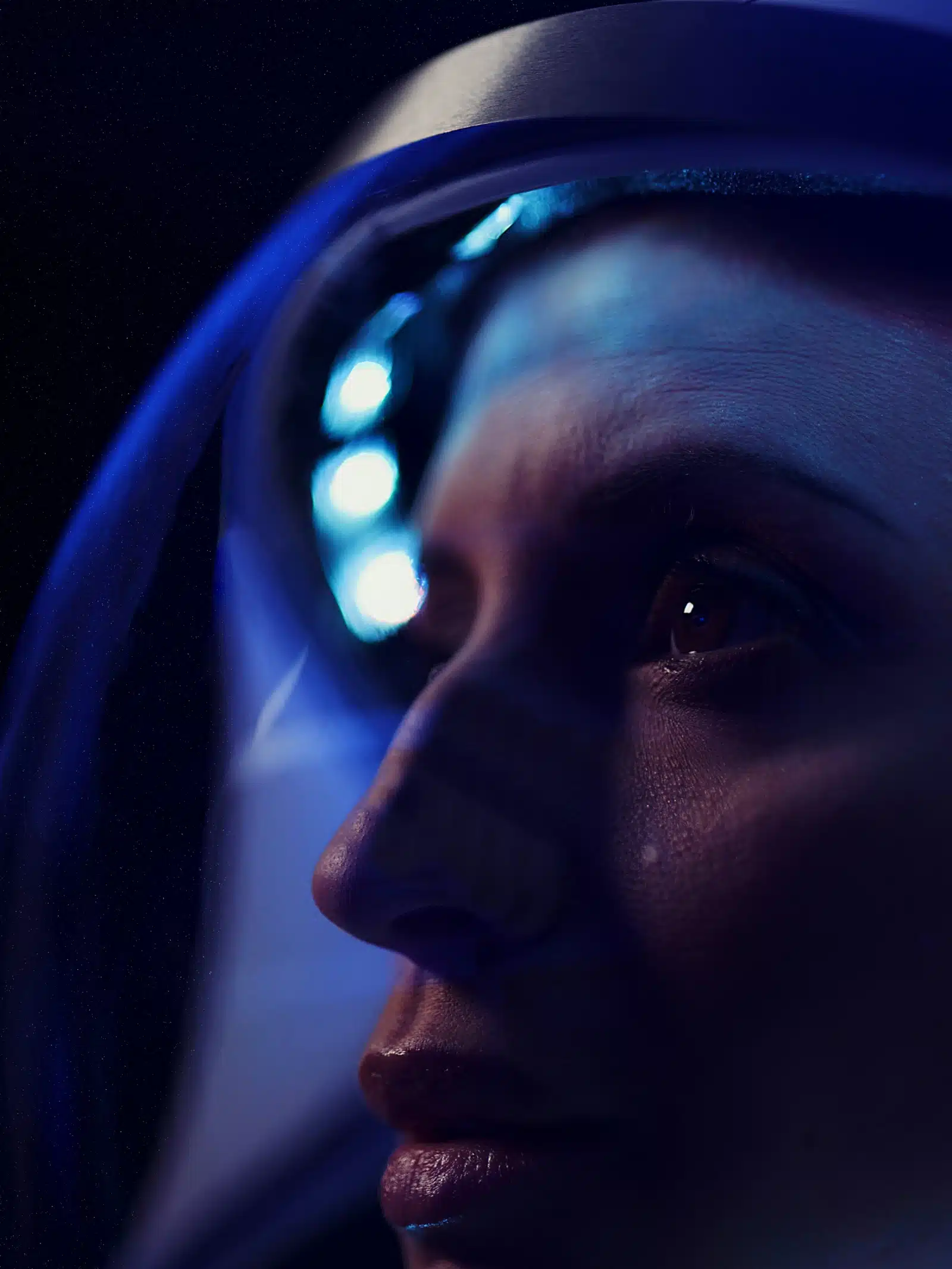 Outsourcing vs. In House Content Creation Side profile closeup of woman wearing glass helmet posing for the camera in bluish light