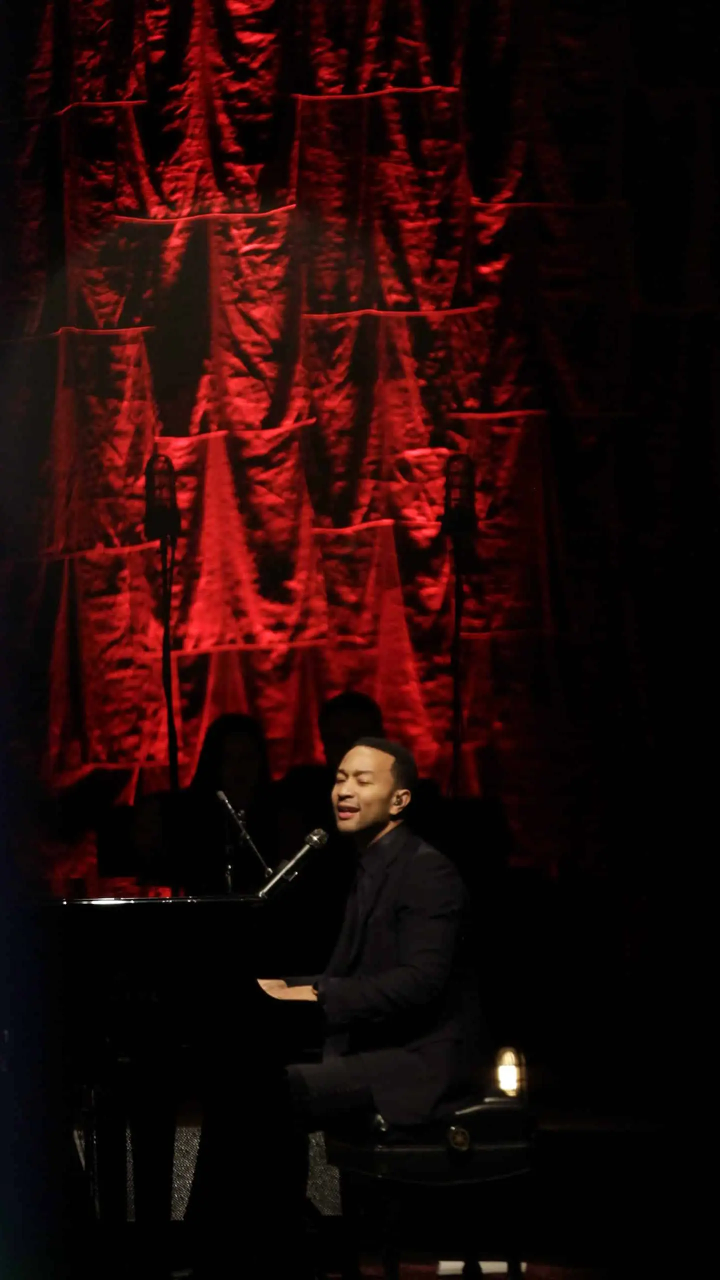 John Legend 8 Side profile of John Legend performing in concert