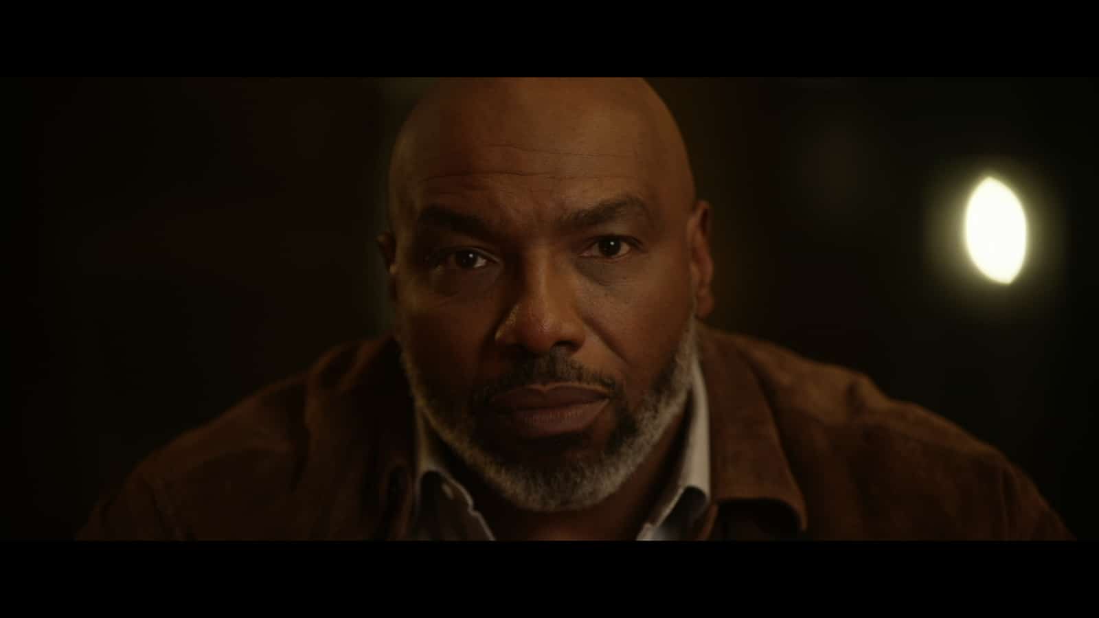 The Dos and Don'ts of Filming CEO Interviews for Corporate Videos Headshot of African American man with short black and white beard posing for the camera
