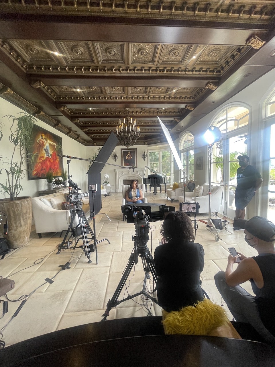 On set with Erika Campbell, crew and equipment