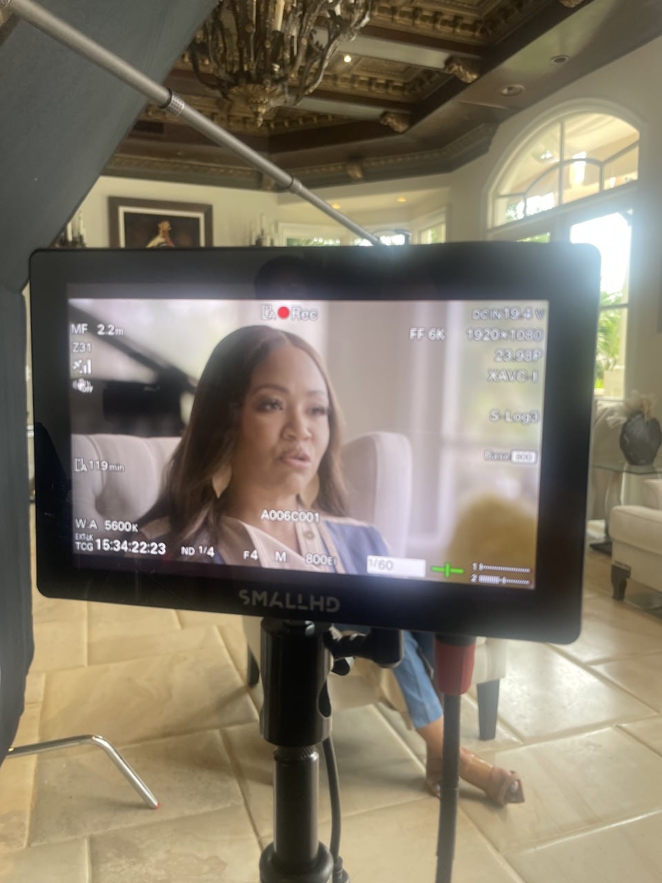 Closeup of video display with Erika Campbell on it
