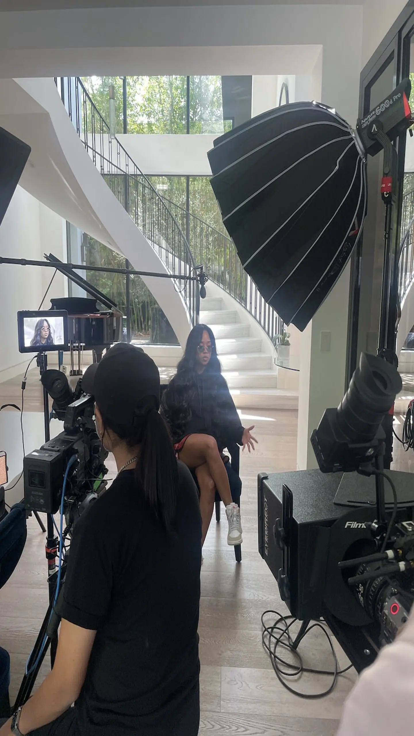 H.E.Rl on set with crew and equipment