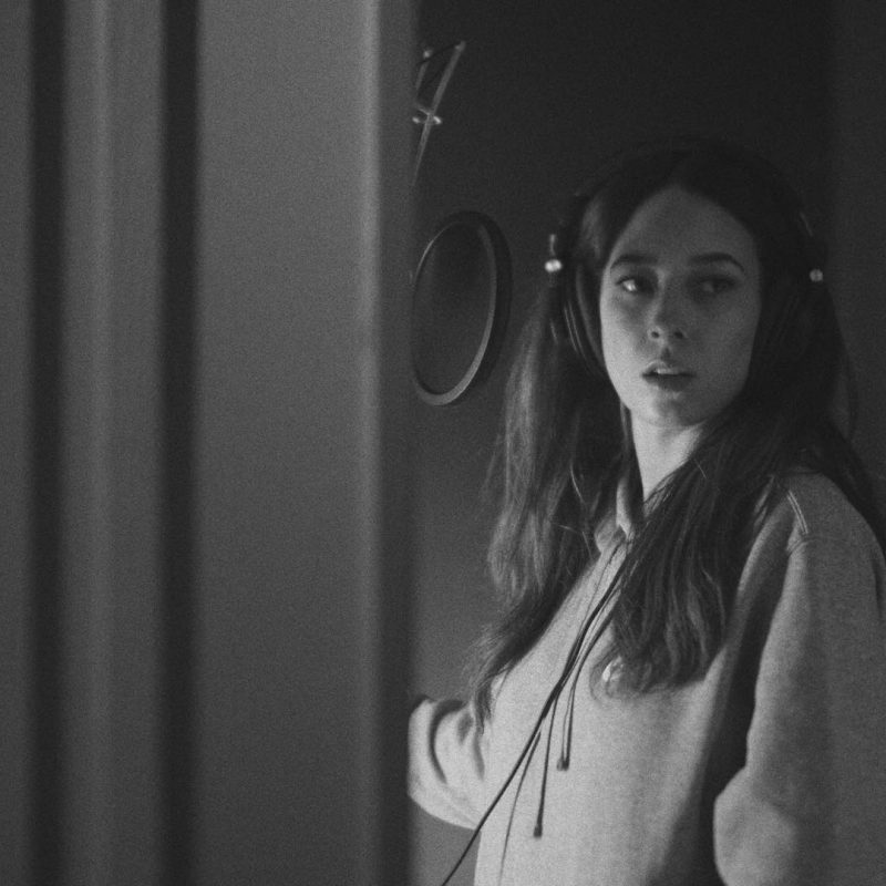 Black and white image of Sabela Synne inside vocal booth