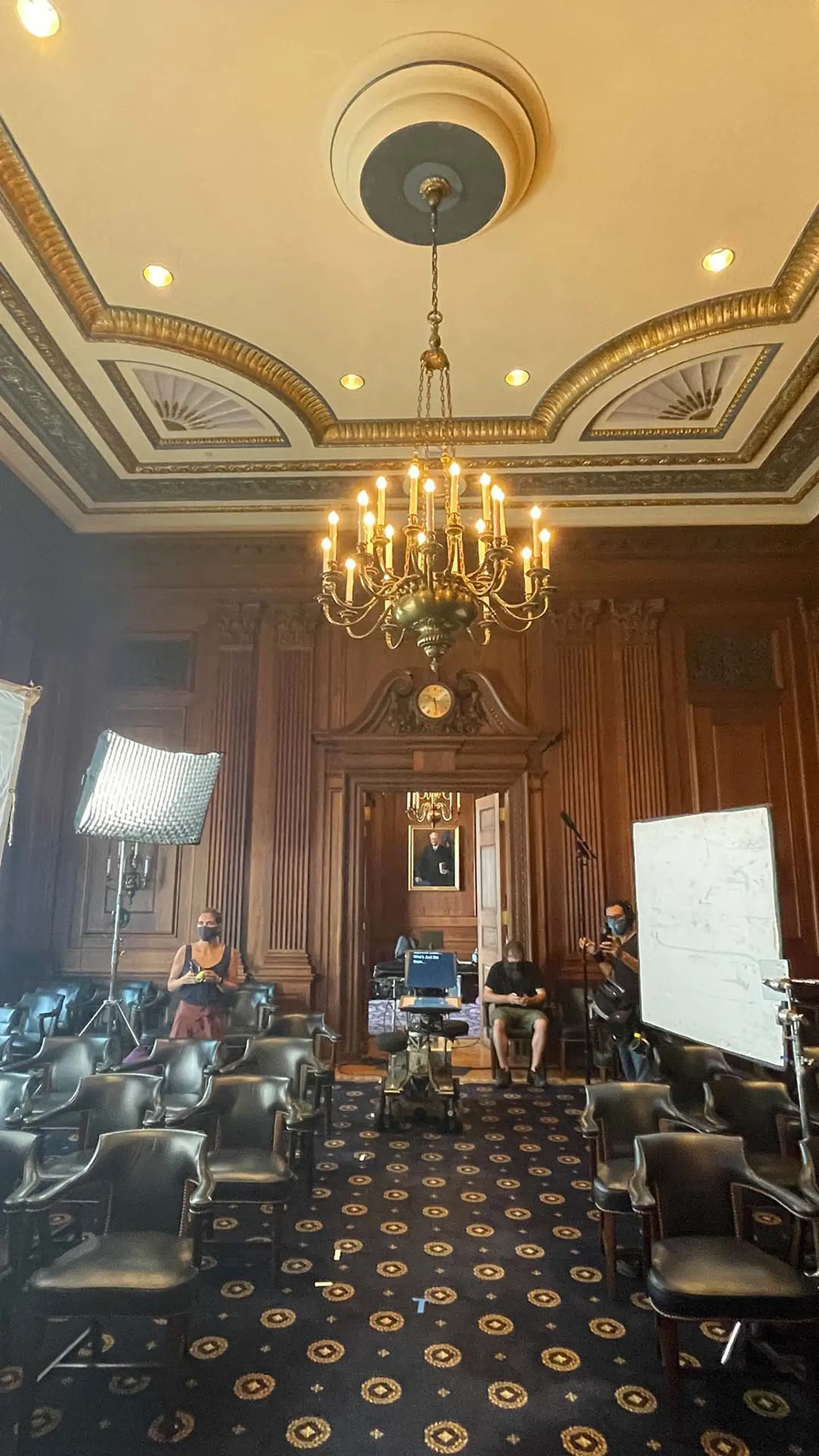 cis-page-video-producer-support Production crew shooting footage in a courtroom