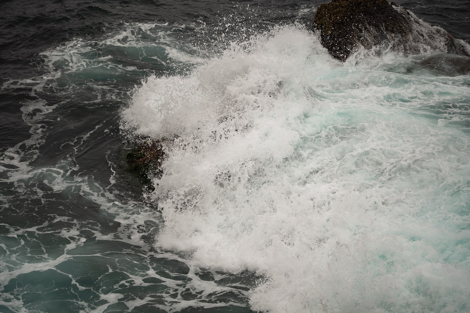 Waves crashing on a rocky coast