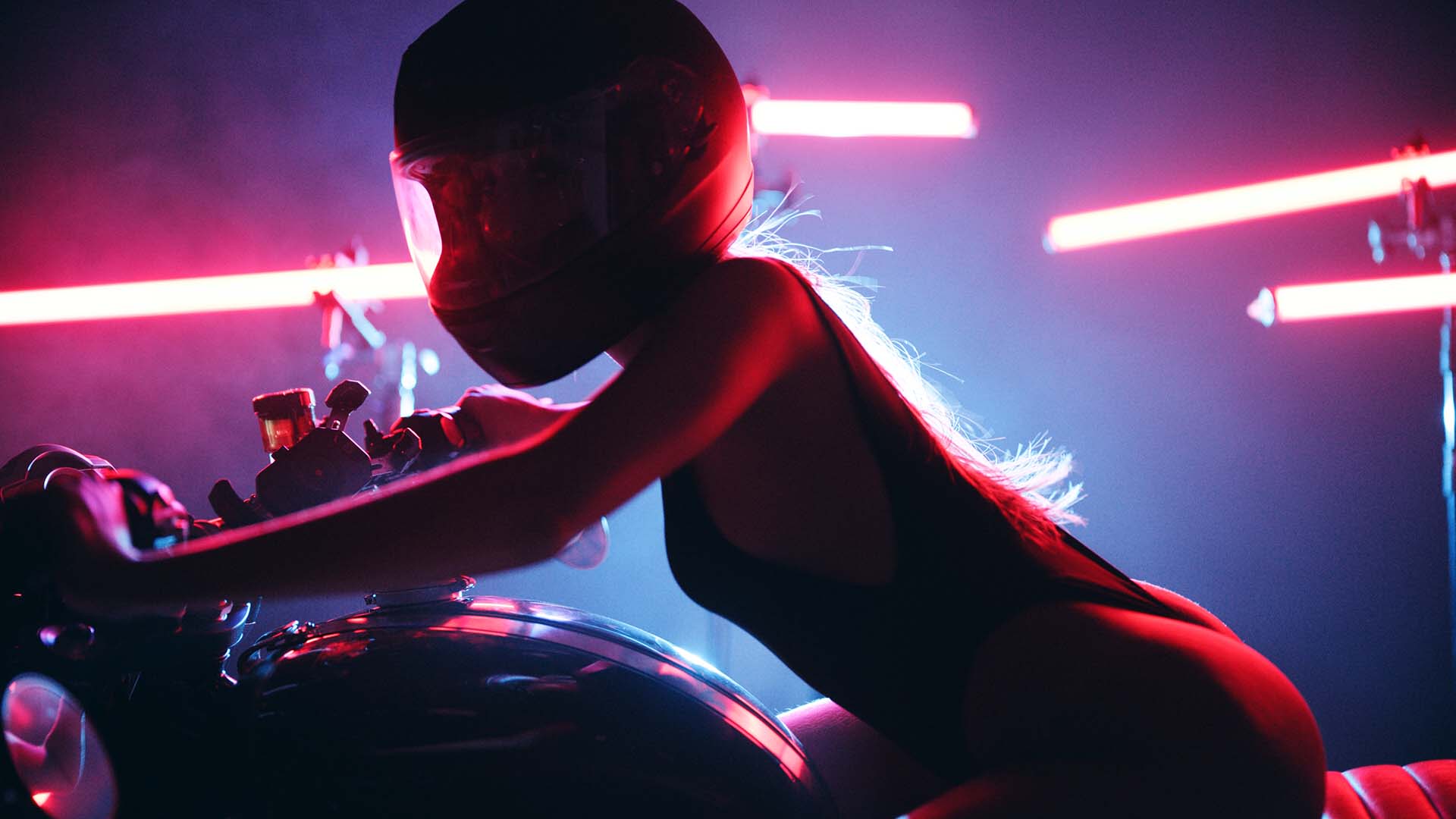 IU CI Studios The Delorean Beatriz Corbet Side profile of her on a motorcycle wearing a helmet