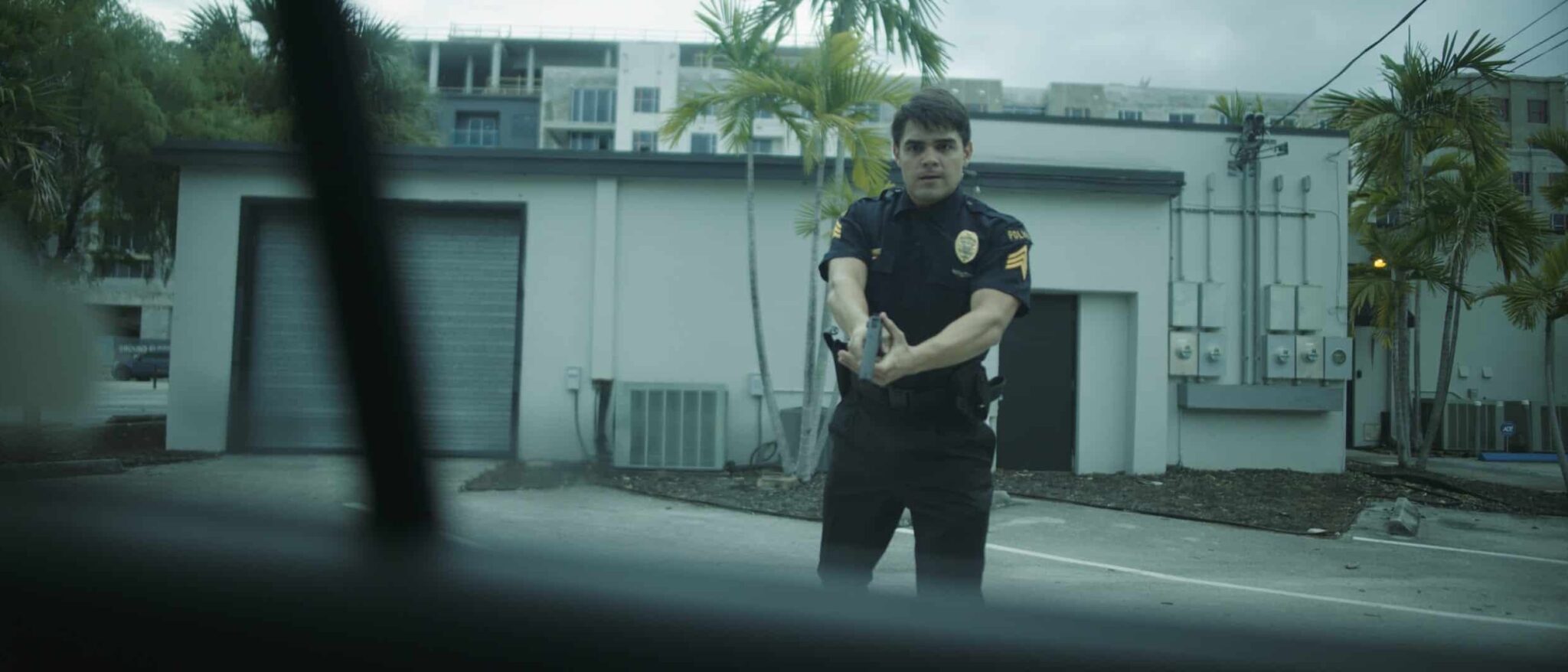 Black Violin One Step Music Video Cop ready to draw gun
