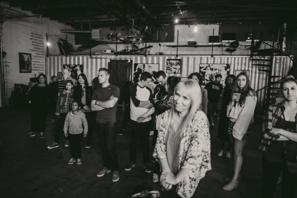Black and white of crew in a studio