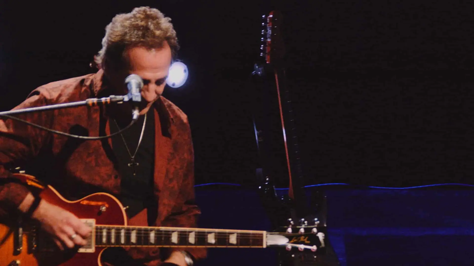Billy Joel 10 Guitarist performing at Billy Joel concert