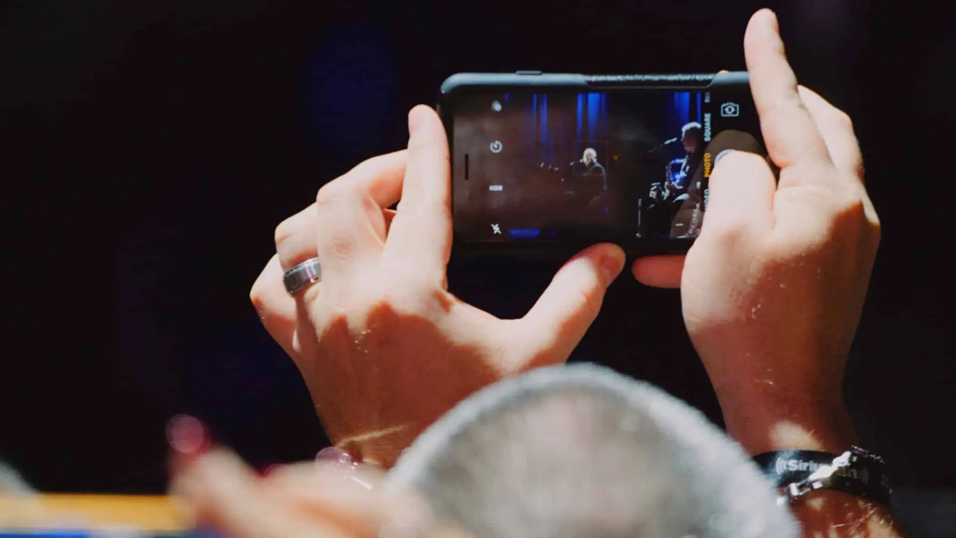 Billy Joel 7 Concertgoer taking picture at Billy Joel concert