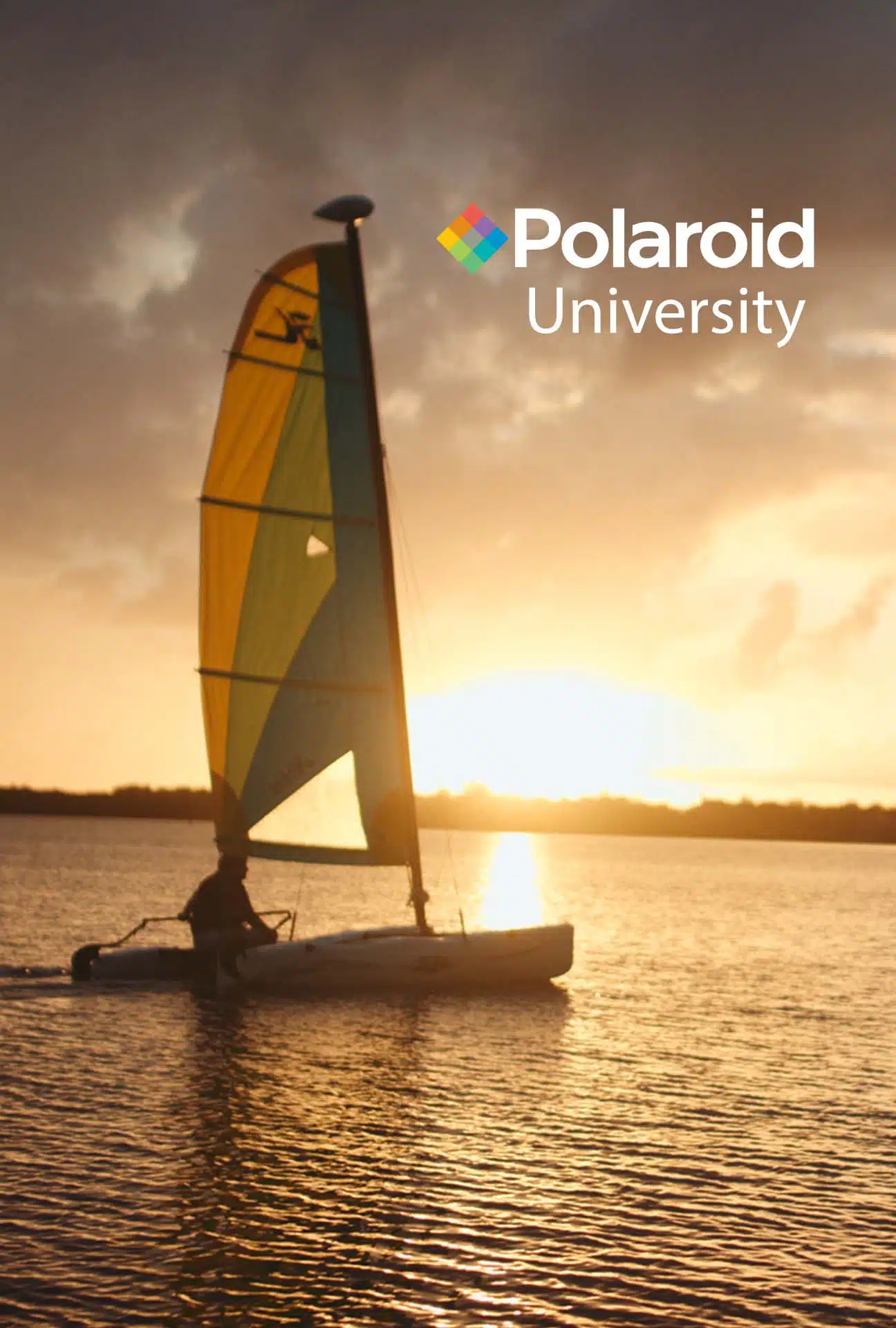 TV Show Pitch Polaroid University poster showing Polaroid University logo and sailboat sailing at sunset
