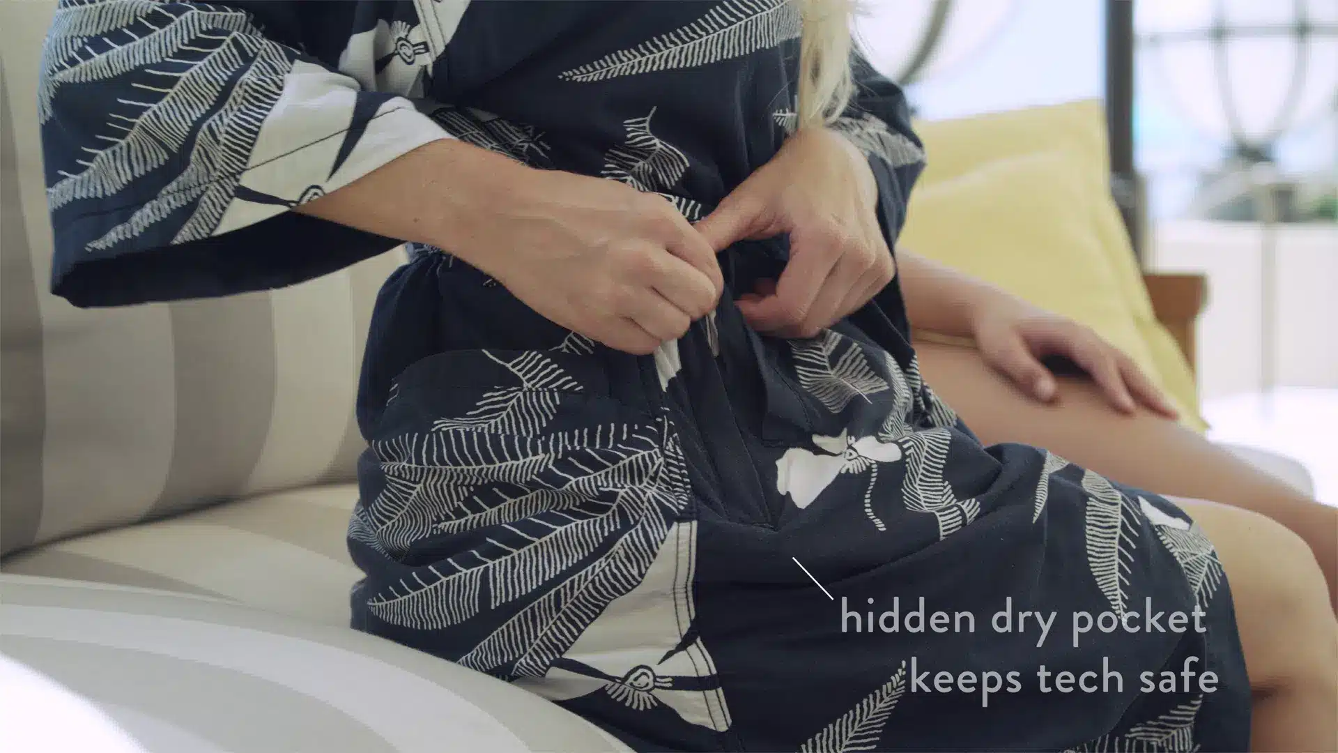 Closeup of outfit that has hidden dry pocket and keeps tech safe