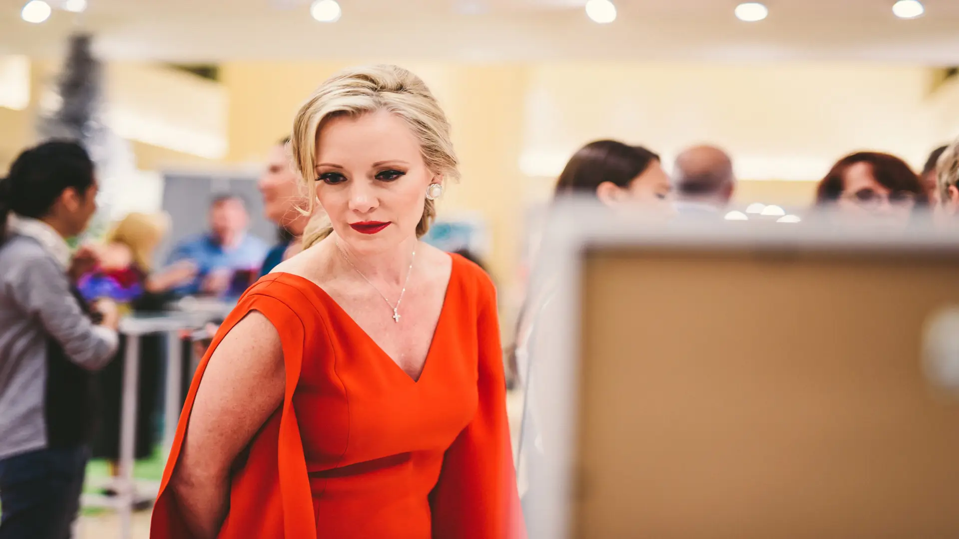 Neiman Marcus 20 Woman dressed in red browsing