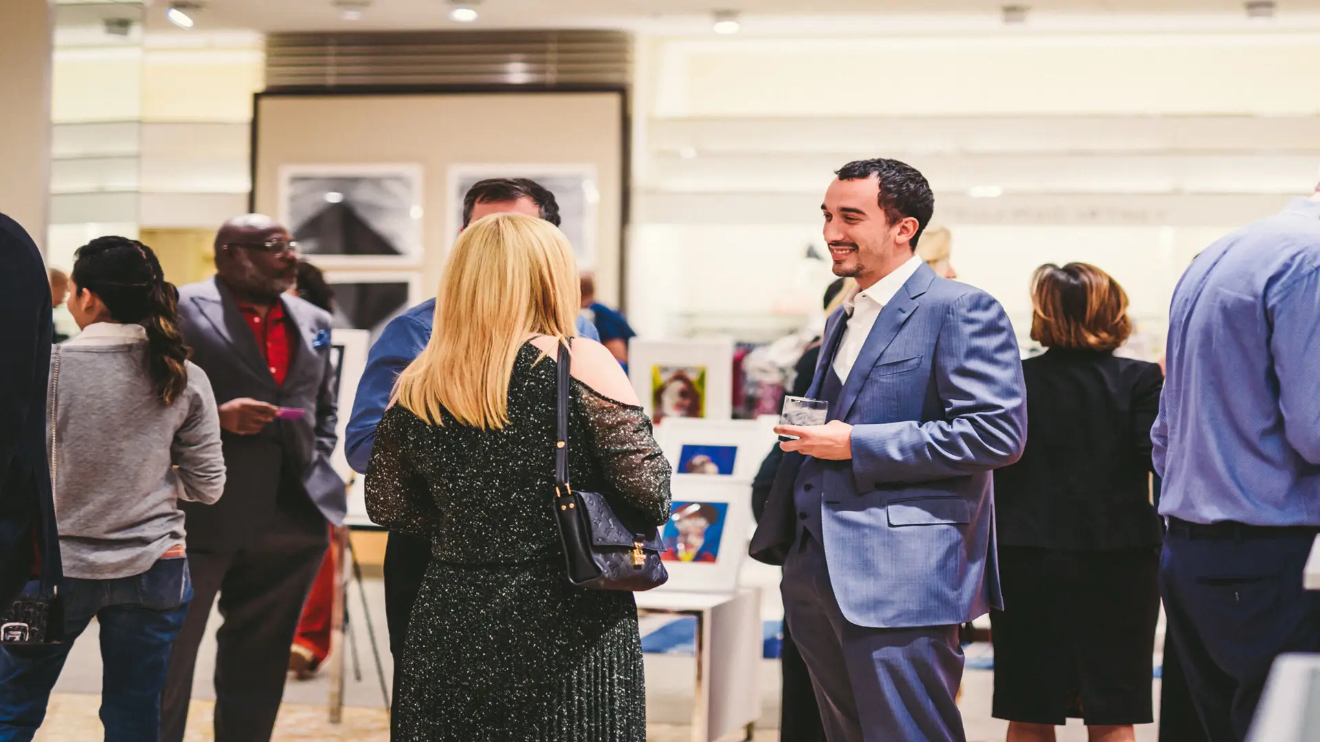 Neiman Marcus 3 Two men talking with woman