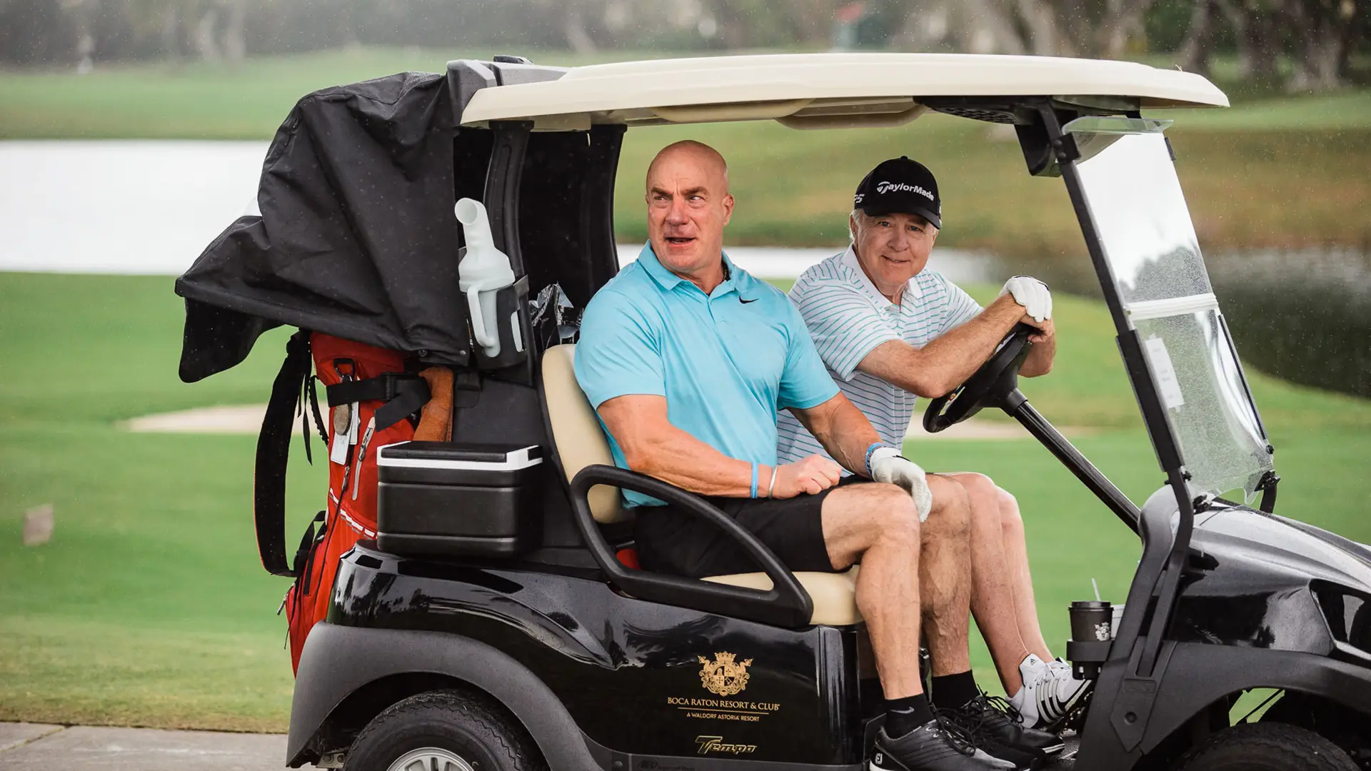 SFBTA 6 Two male golfers in a golf cart