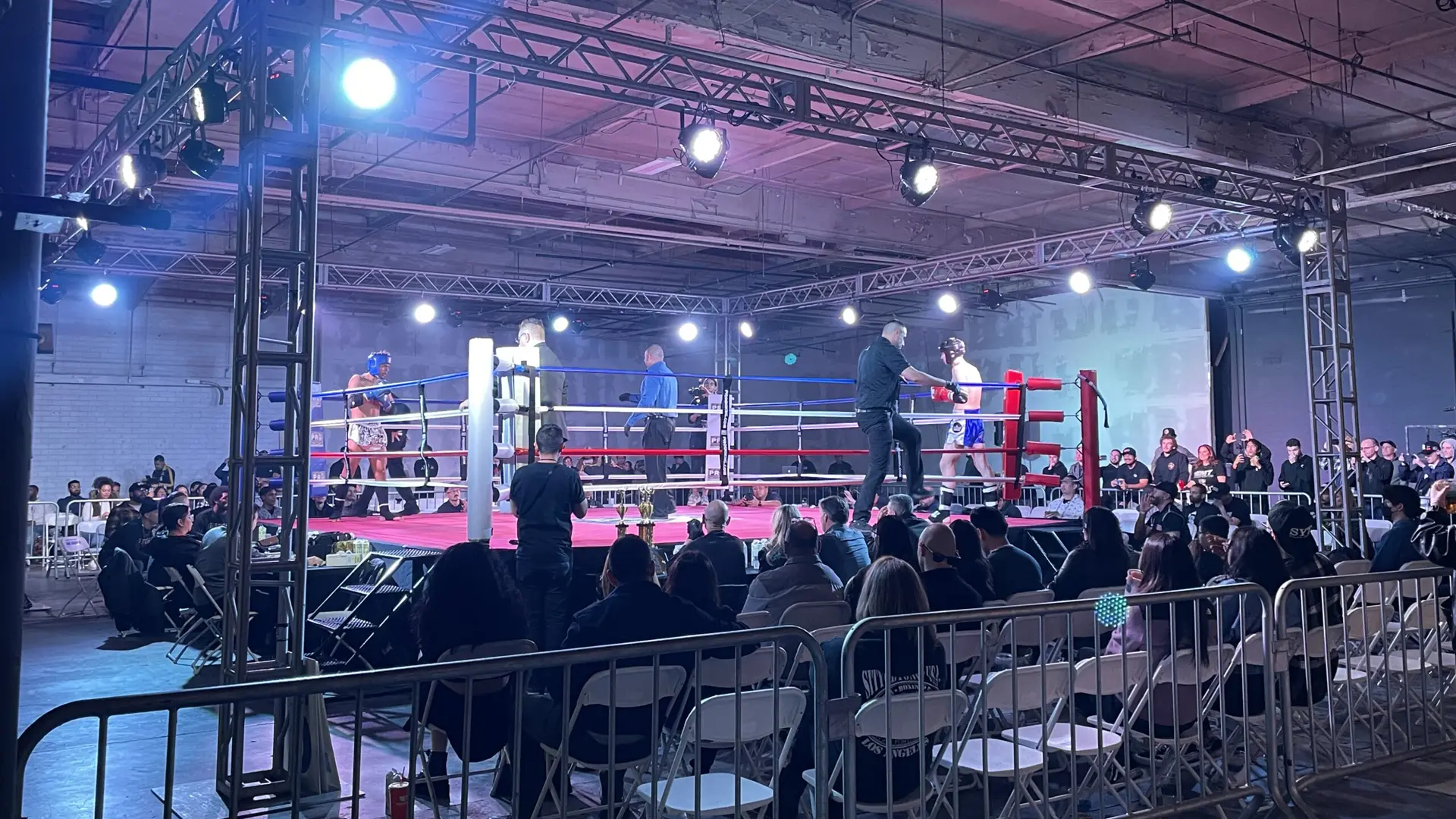 Studio Rentals Los Angeles 6 Crowd inside event space rental Los Angeles watching two boxers in a ring