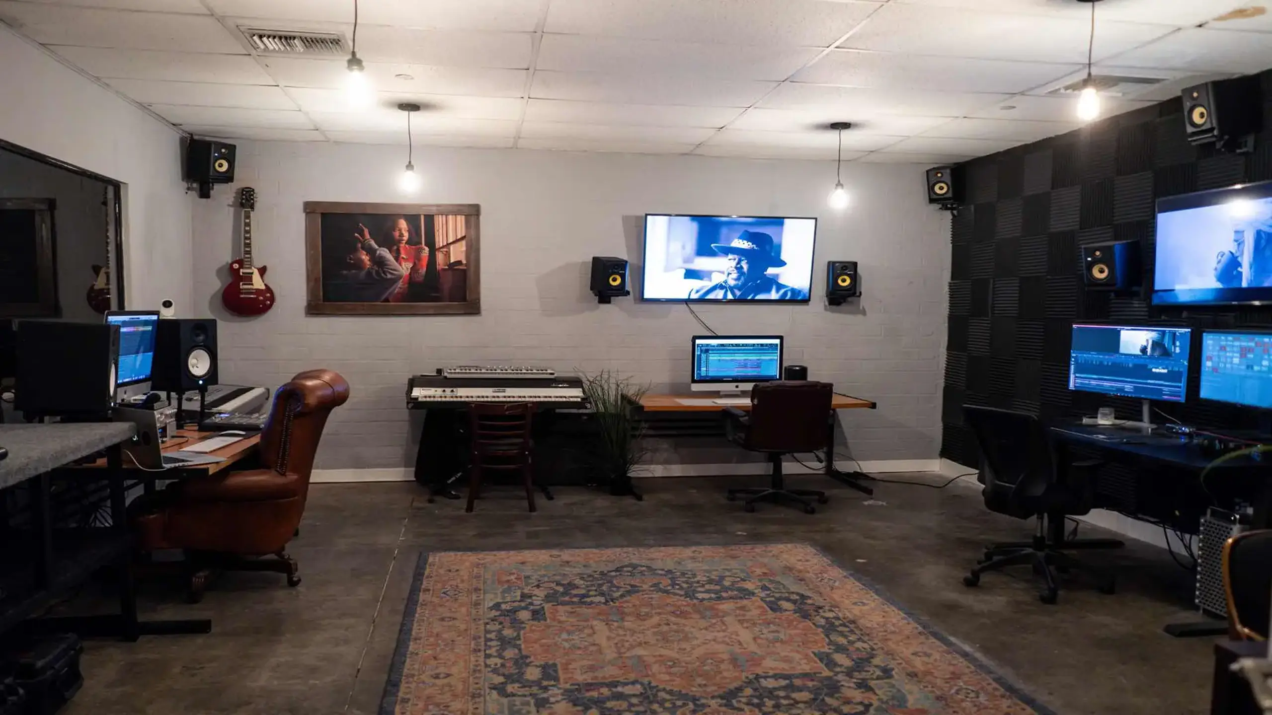 Will a Video Production Company Handle Editing and Color Grading? 1 video production company post-production suite with color grading monitors and editing workstation