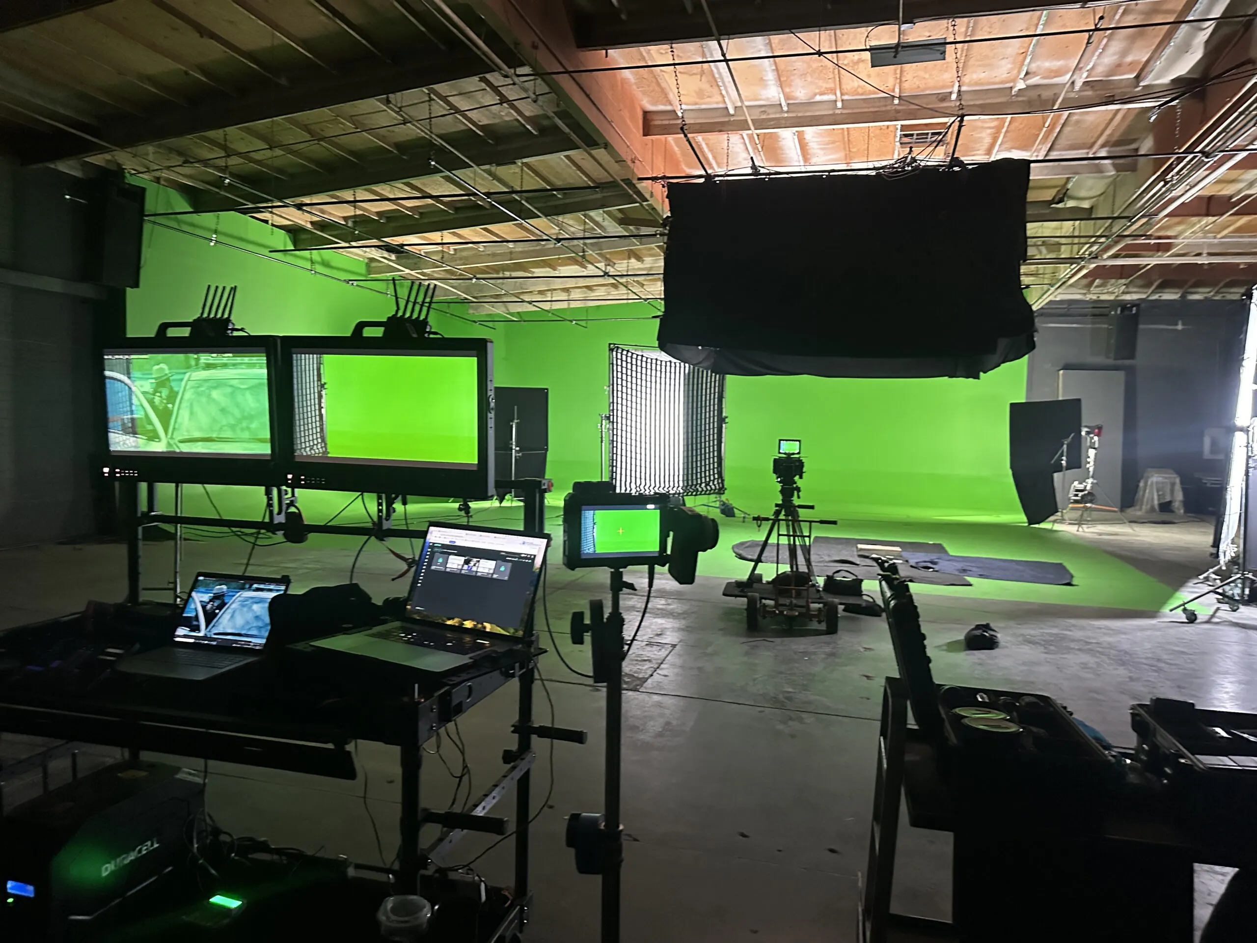 Video village with the green screen cyc wall behind