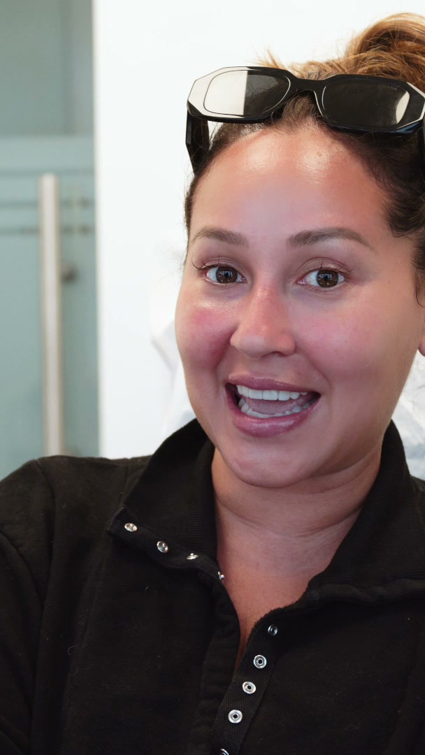 Dr. V Cosmetic Dental 13 Adrienne Bailon smiling cosmetic dental patient still