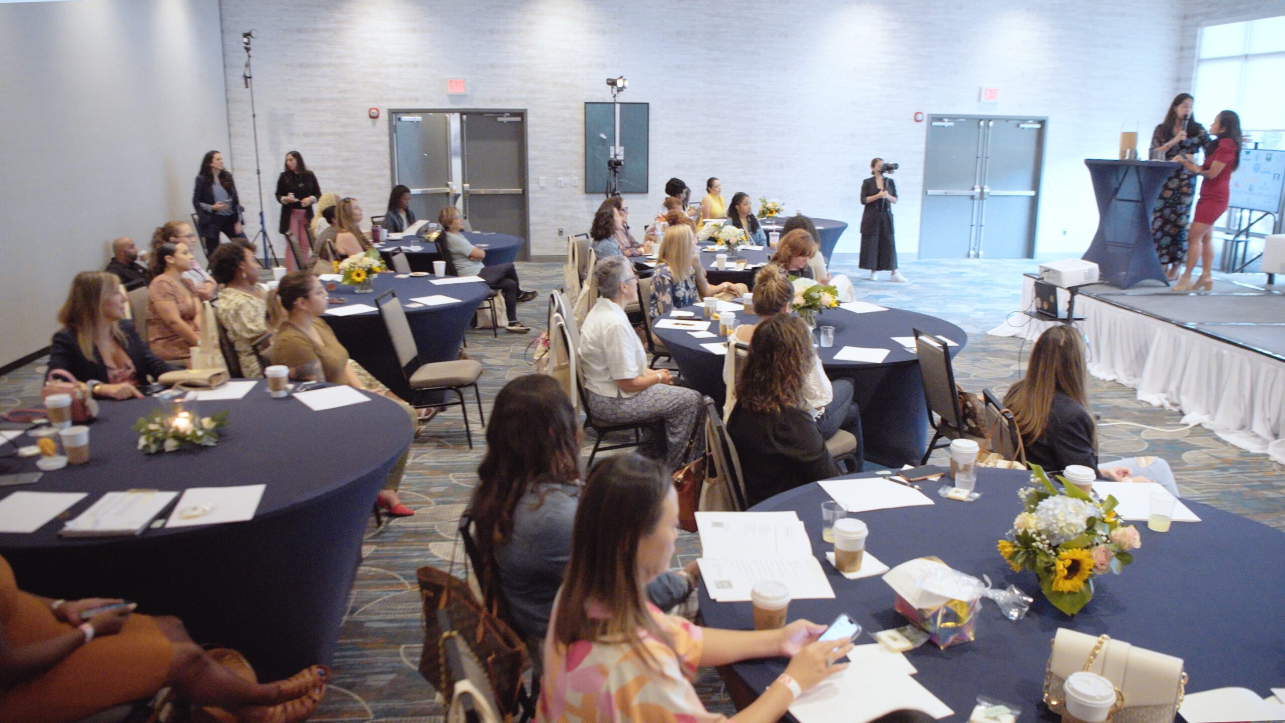 The Motherhood Village 4 Attendees seated in the seminar room at the Mom Conference