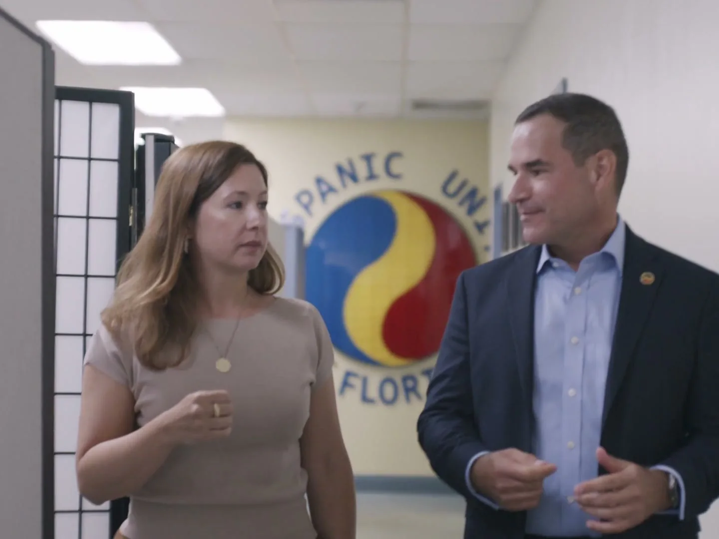 Hispanic Unity of Florida 5 Hispanic Unity of Florida staff speaking with a community member