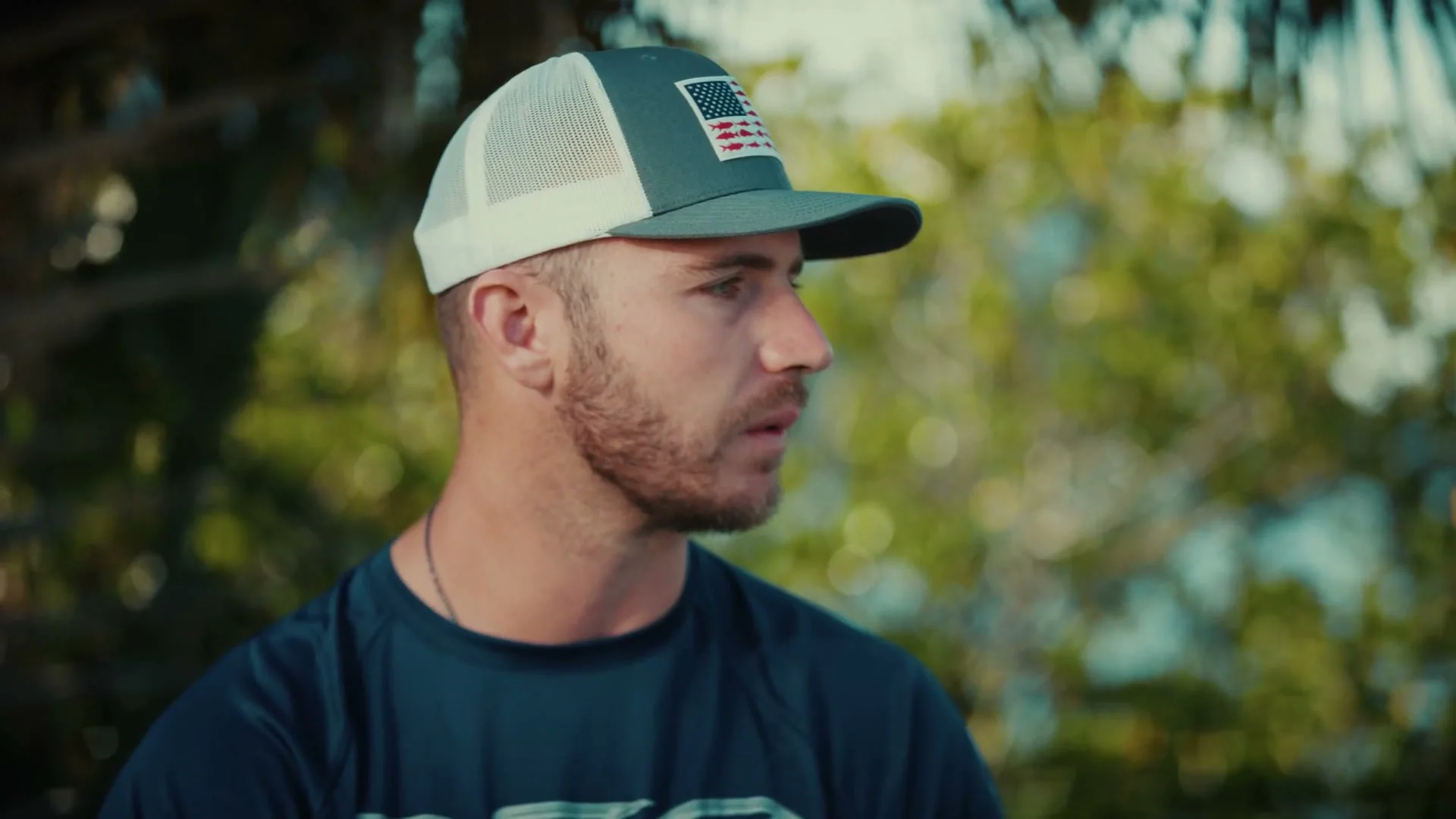 Columbia PFG: Pete Alonso 11 Pete Alonso in a white Columbia PFG cap, profile on the water