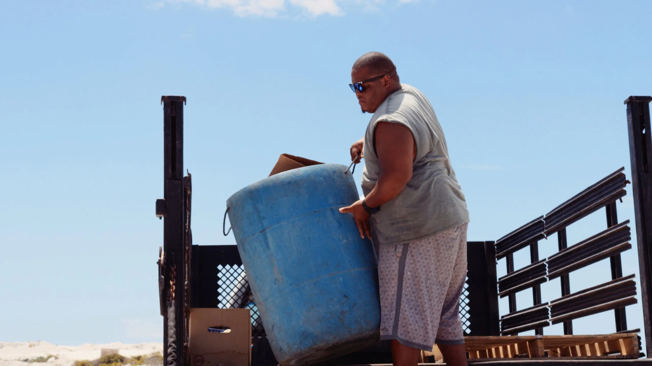 Marina Bland at Ragged Island 2 Community member unloading supplies on Ragged Island