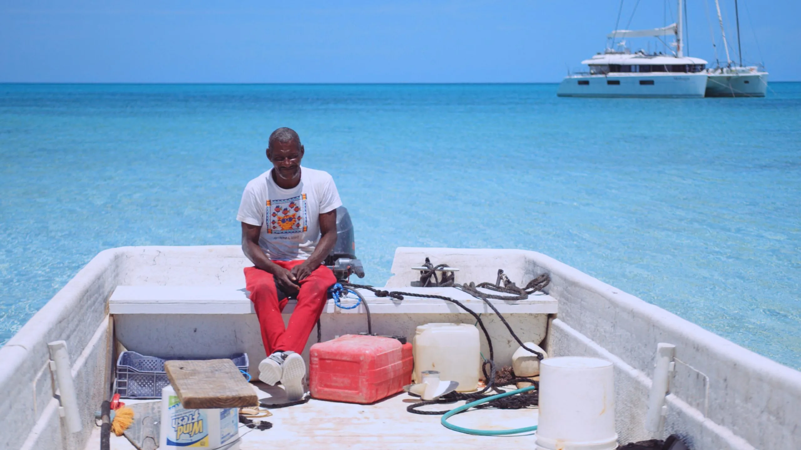 Marina Bland at Ragged Island 10 A fisherman on the turquoise waters off Ragged Island