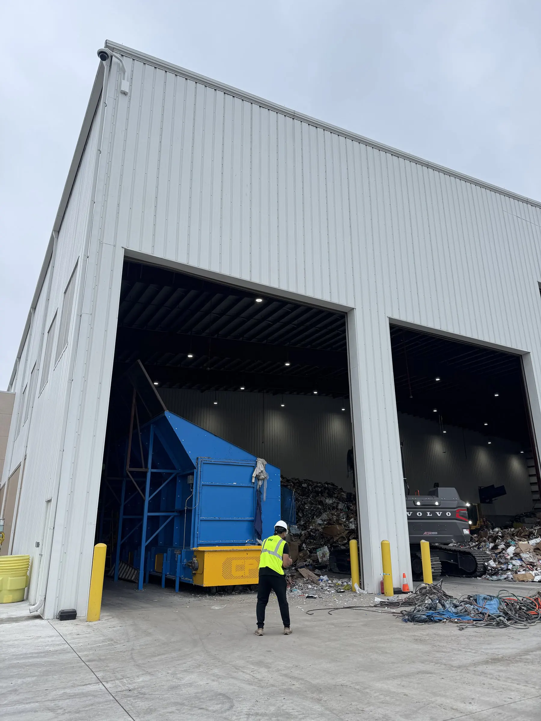 Conceptual Communications: Waste Management 30 Waste Management recycling facility tipping floor bay doors, Florida video production