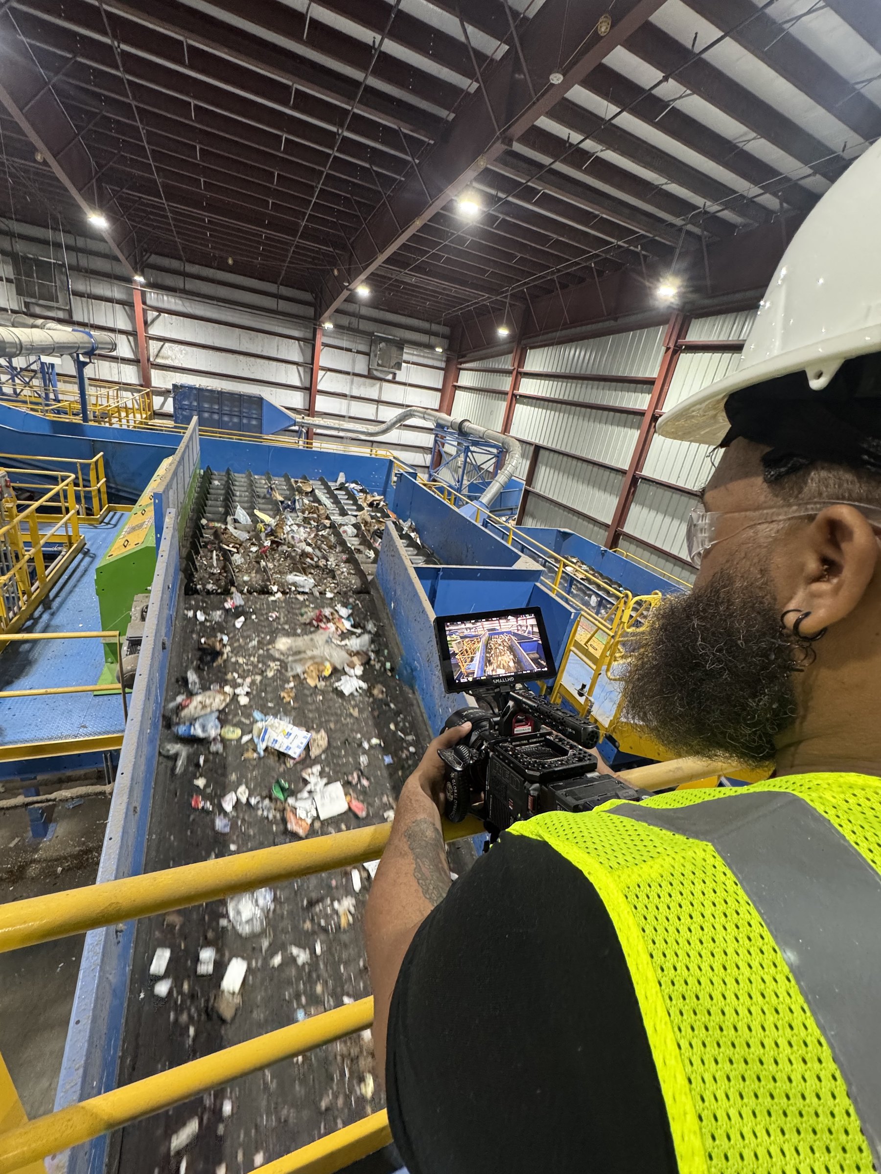 Conceptual Communications: Waste Management 10 Overhead view of Waste Management recycling sorting line, Florida video production