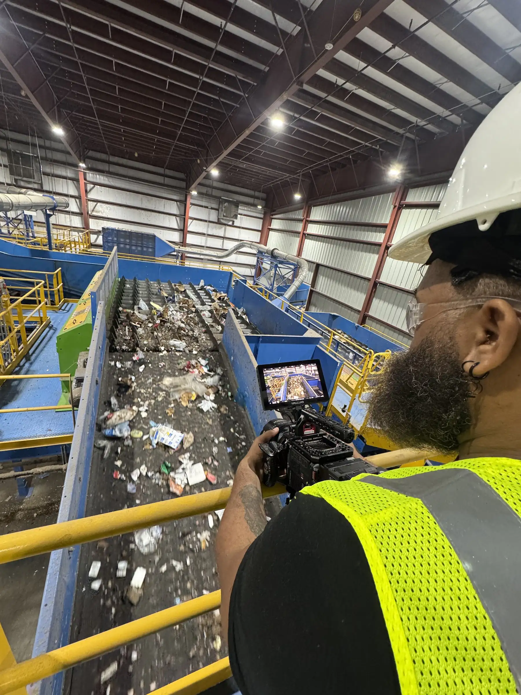 Conceptual Communications: Waste Management 11 Overhead view of Waste Management recycling sorting line, Florida video production